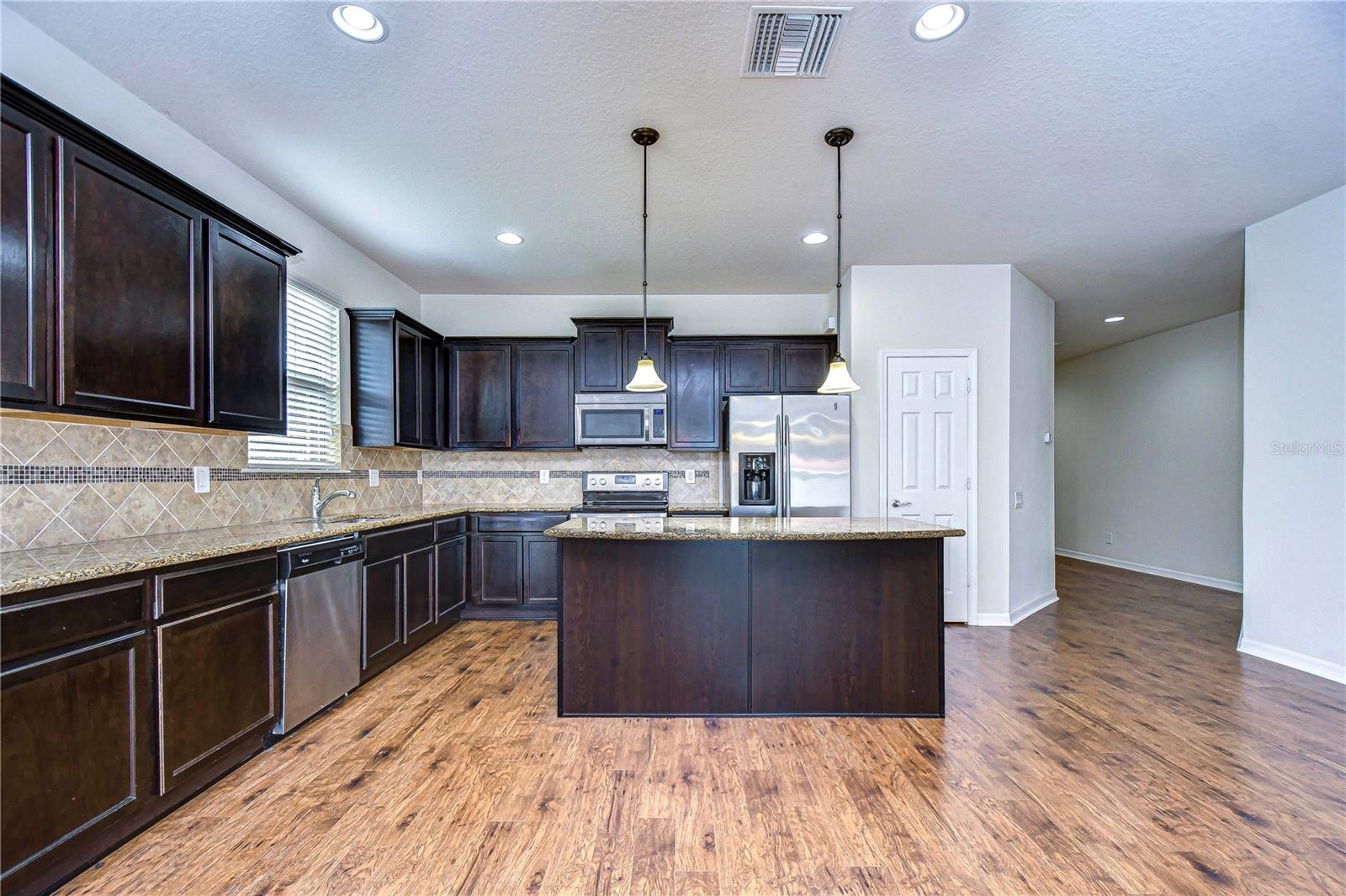 Chefs Kitchen with expresso cabinets!