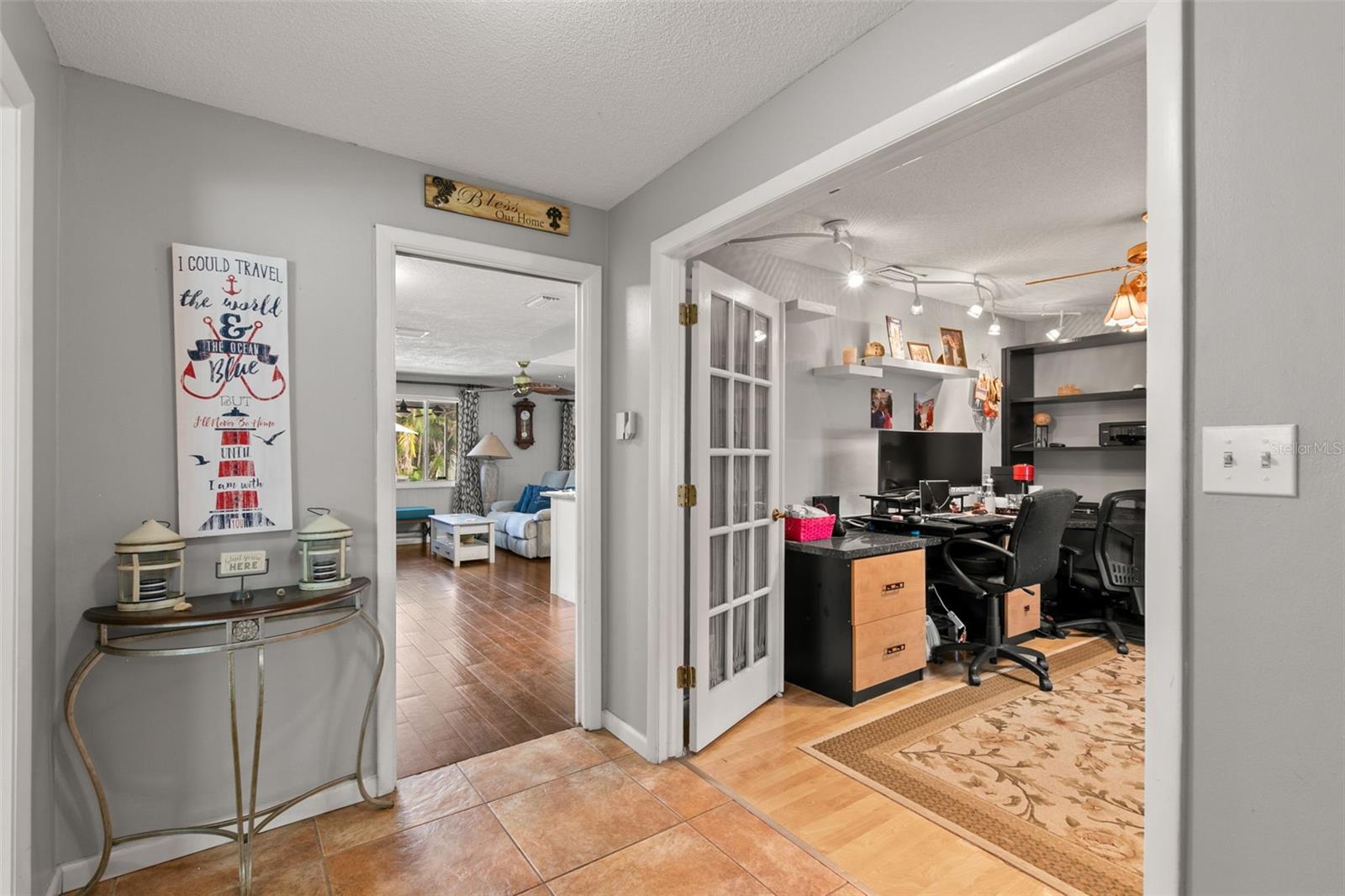 Foyer leading into the home - Den/Formal Dining to left -