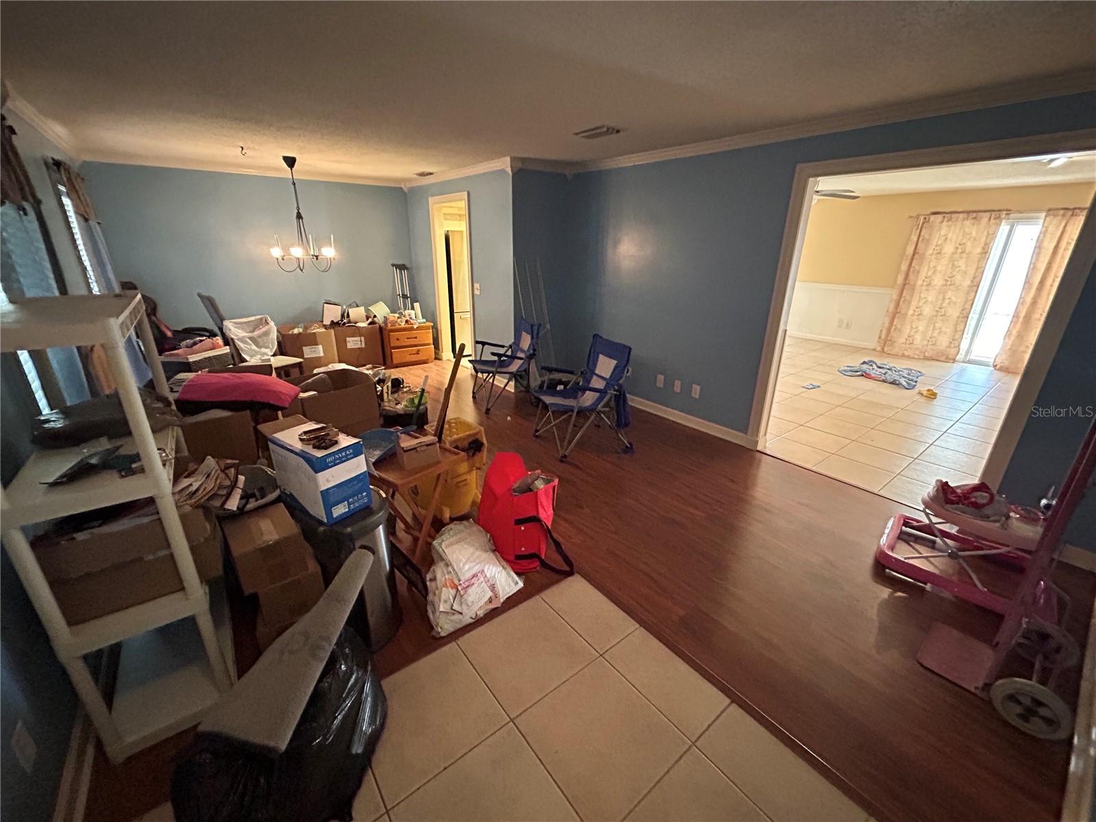 Dining room/family room combo. Rest of seller things will be removed from property and updated photos coming soon!