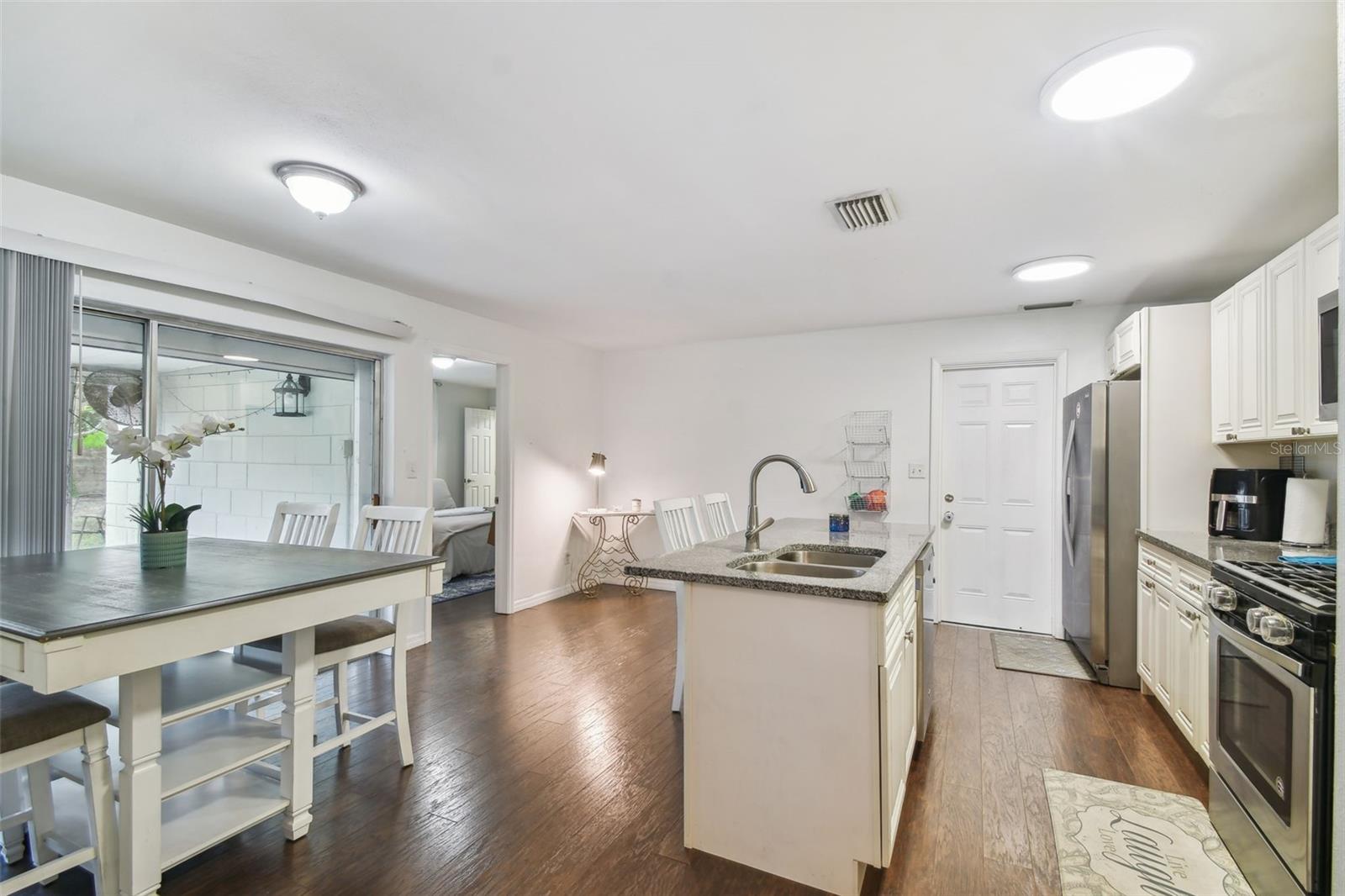 View of Open Kitchen from Hallway