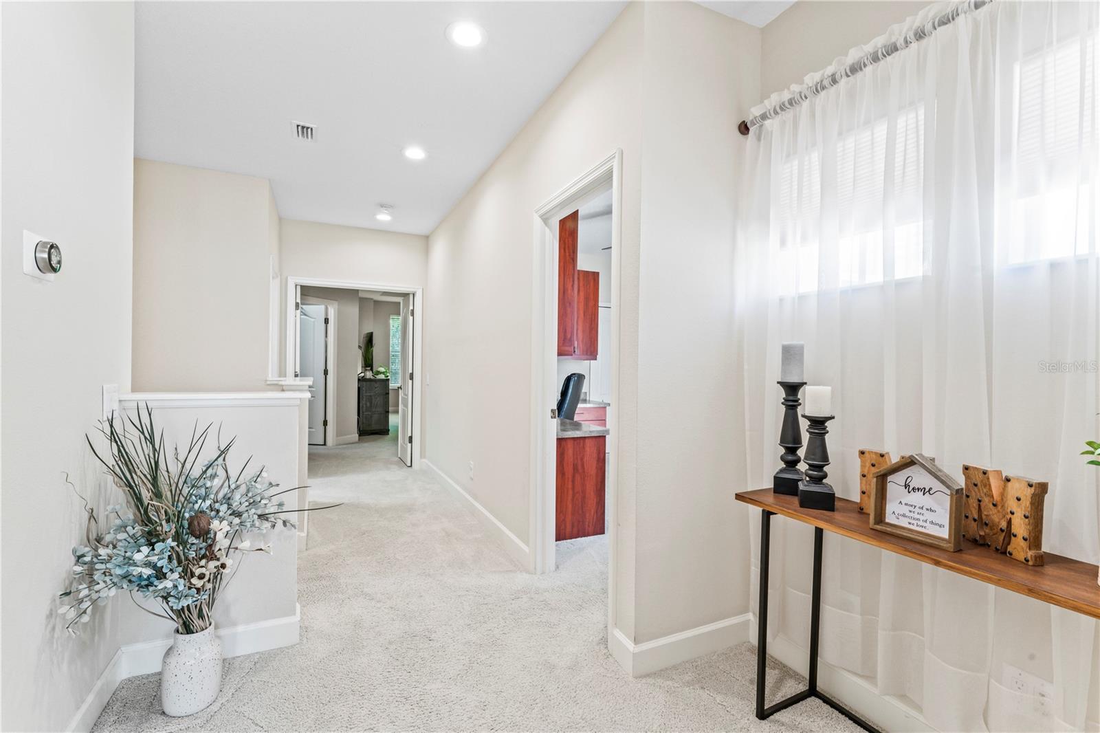 Second floor Office with built-ins, and Primary Bedroom ahead