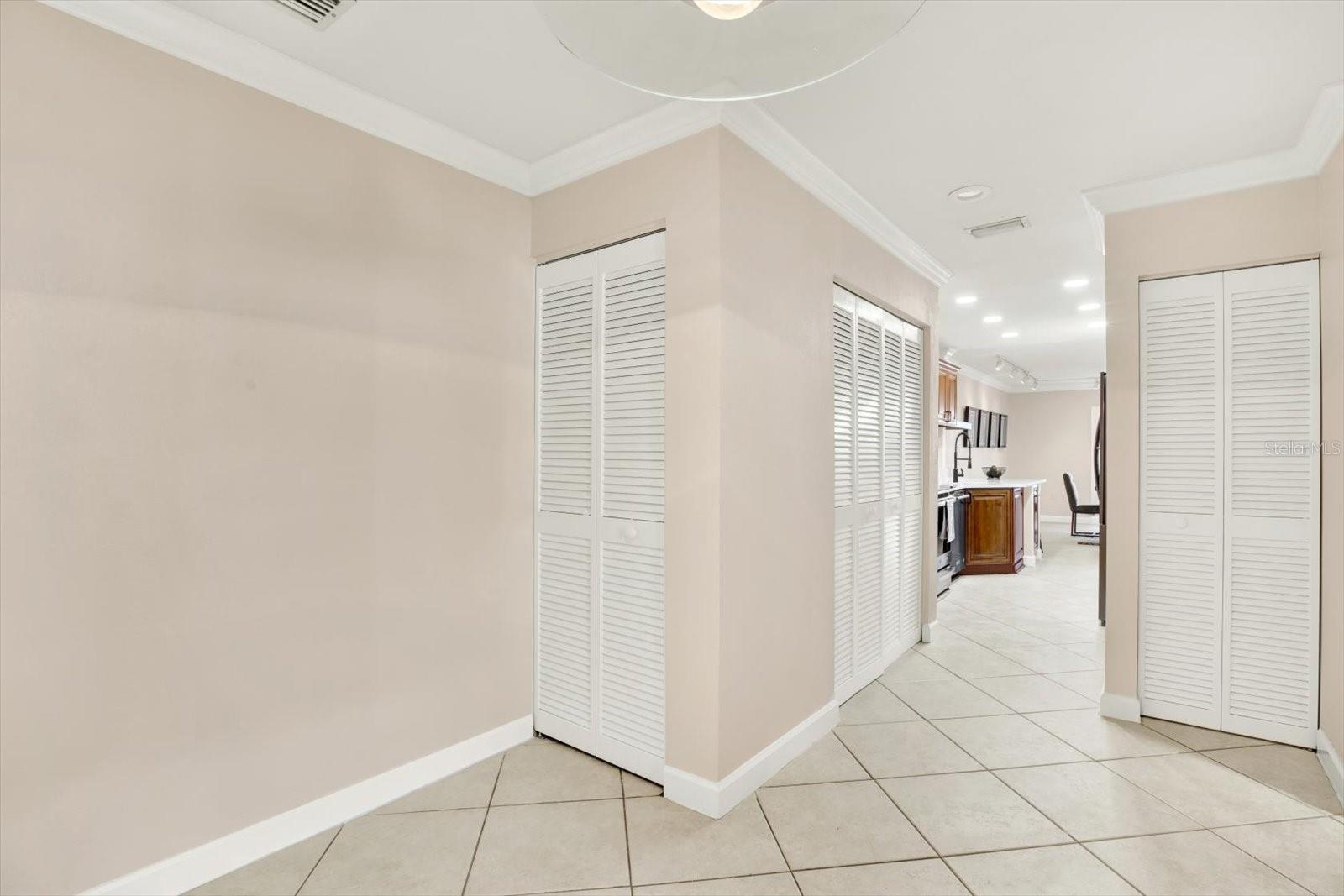 entryway off garage- washer & dryer in closet