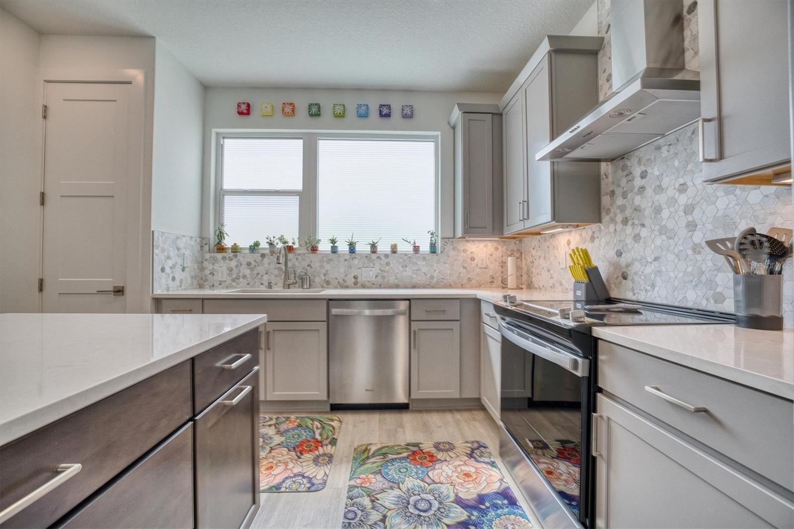 2nd floor - open kitchen area with TONS of natural light