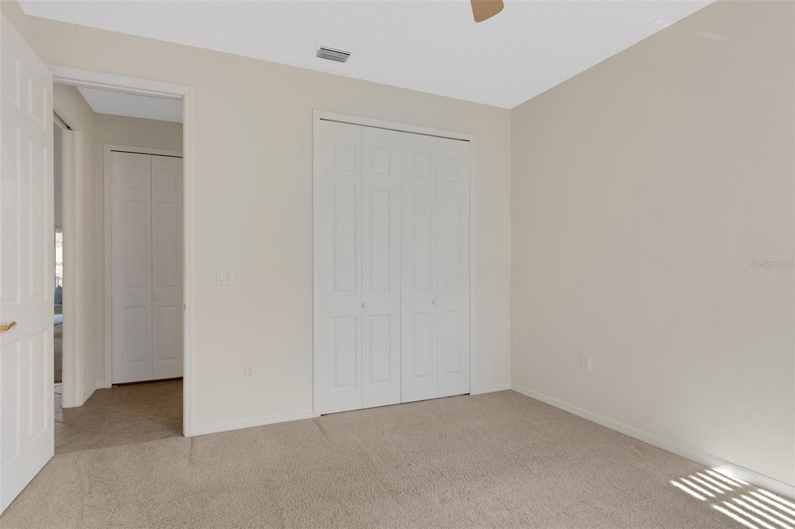 Built-in closet in guest bedroom