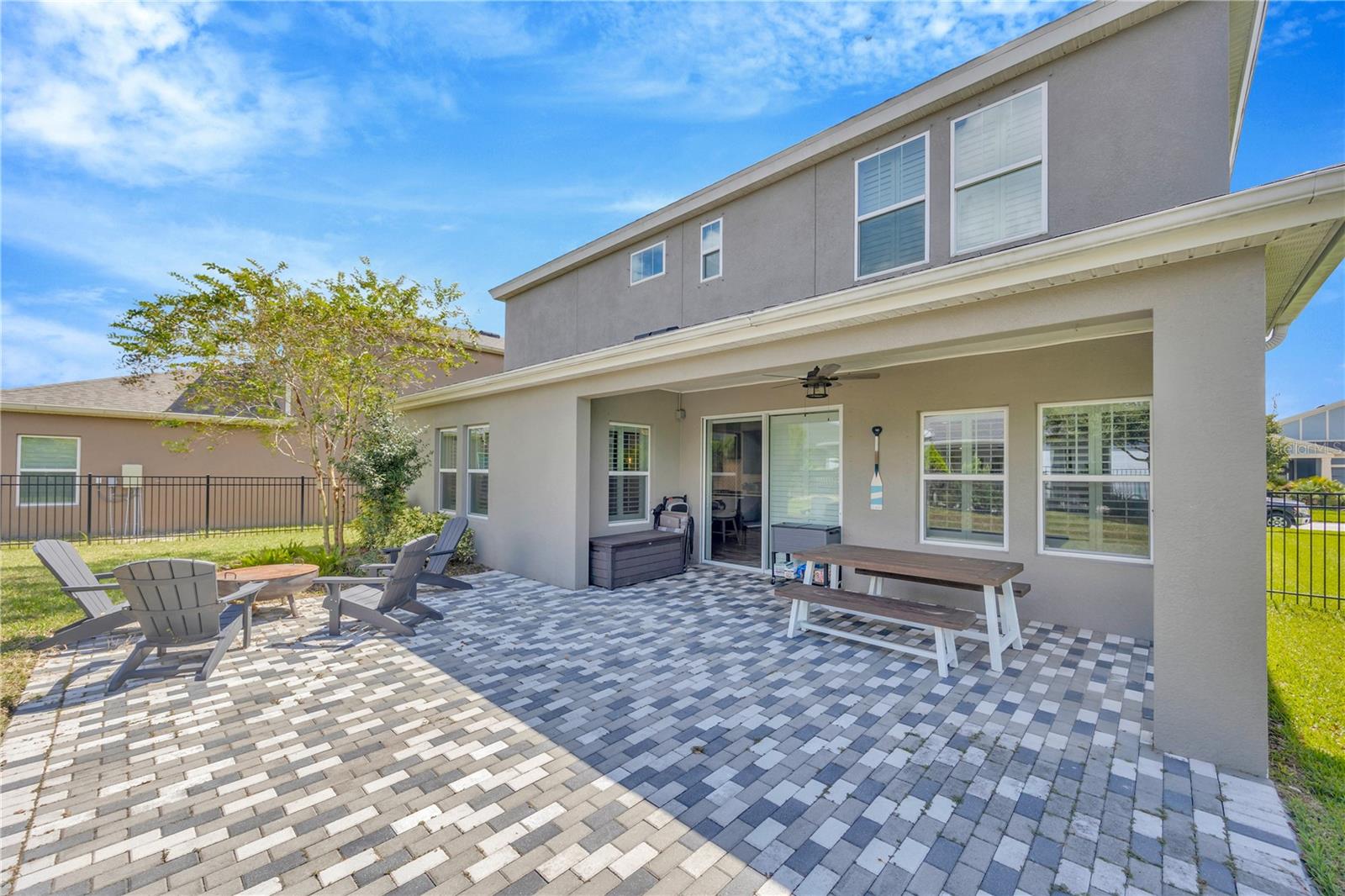 Gorgeous custom pavers for plenty of backyard space to enjoy.