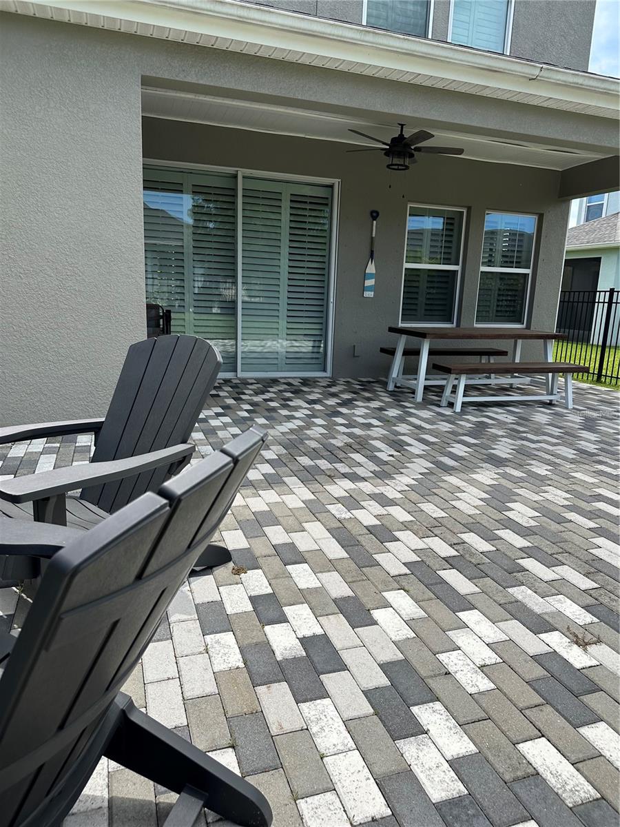 Large patio with Pavers and fully fenced yard