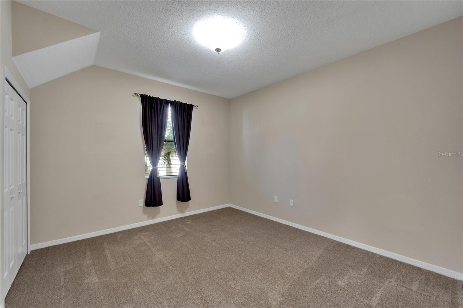 Bedroom 4 adjacent to Bathroom 3 (Hallway)