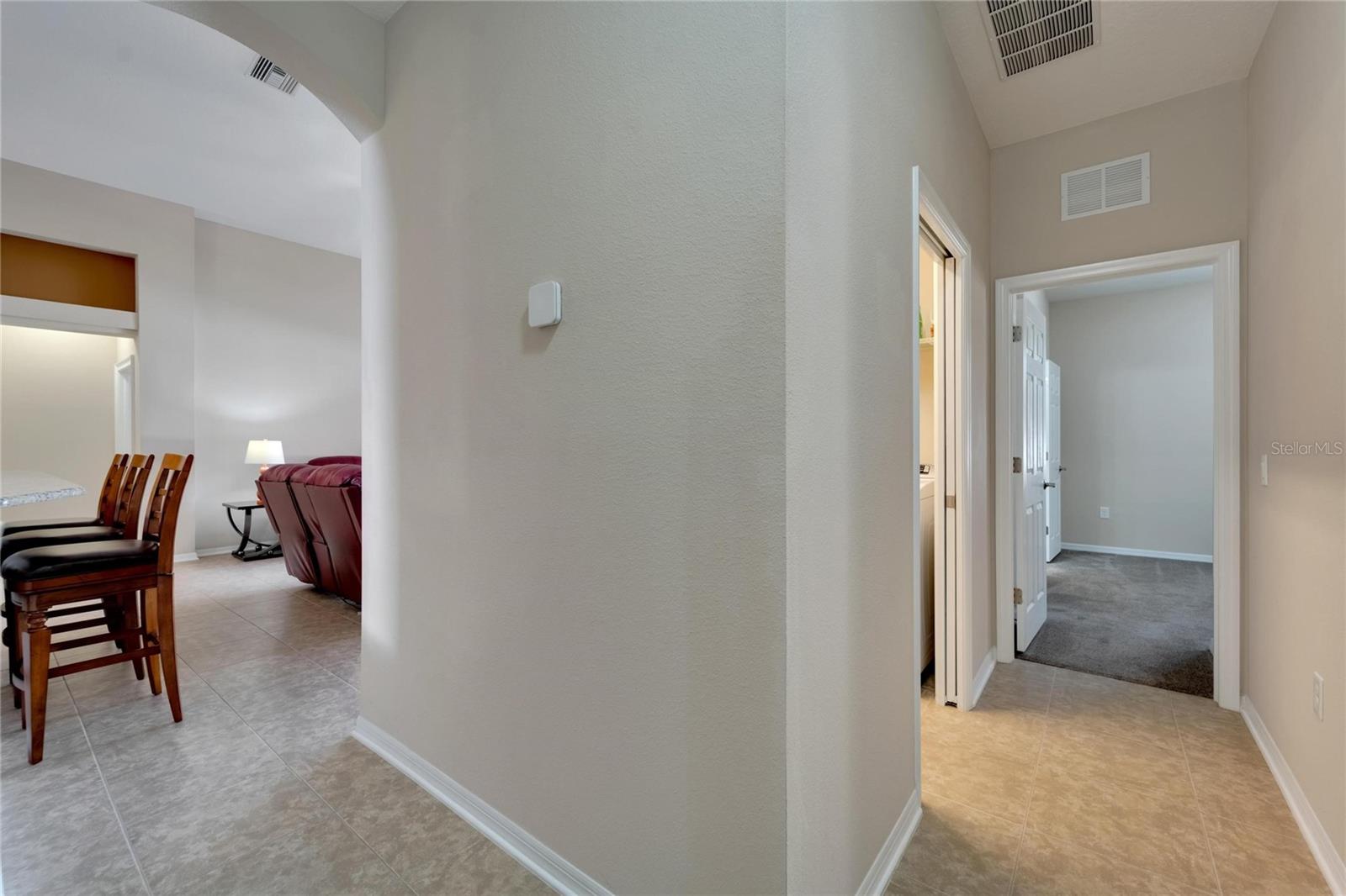 Hallway with access to Laundry Room, Bathroom 3, Bedrooms 2-3-4