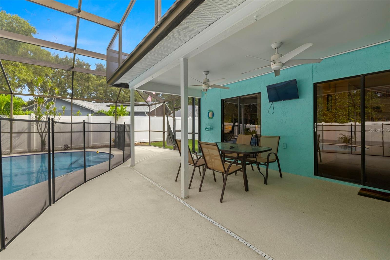 Spacious patio, detachable pool gate