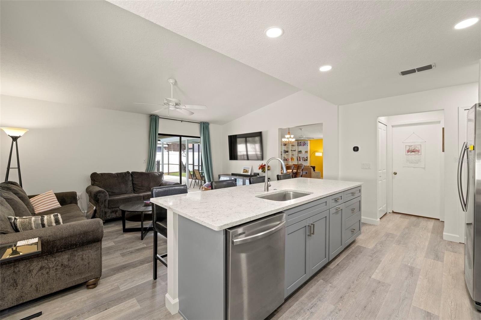 Capped lighting, open kitchen, perfect for entertaining