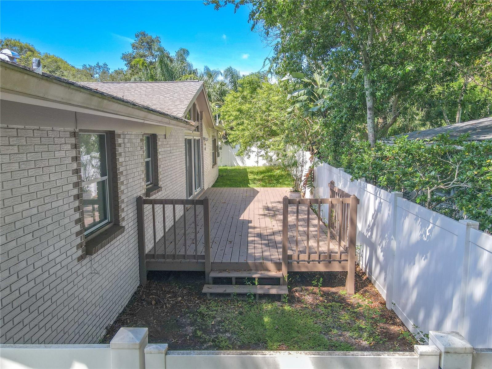 Step into the backyard through sliding glass doors onto the deck. Ideal for cooking out, or enjoying morning coffee.