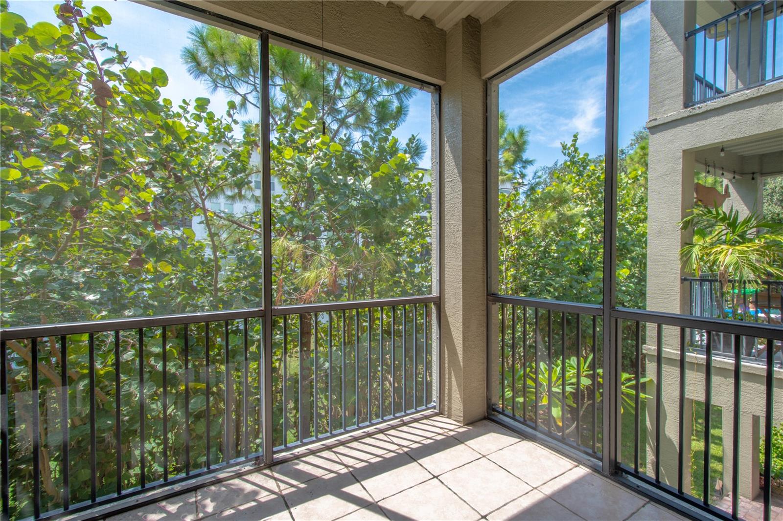 Sunlight gently filters onto the balcony, creating a warm and inviting space where you can relax and soak in the peaceful ambiance of your surroundings.