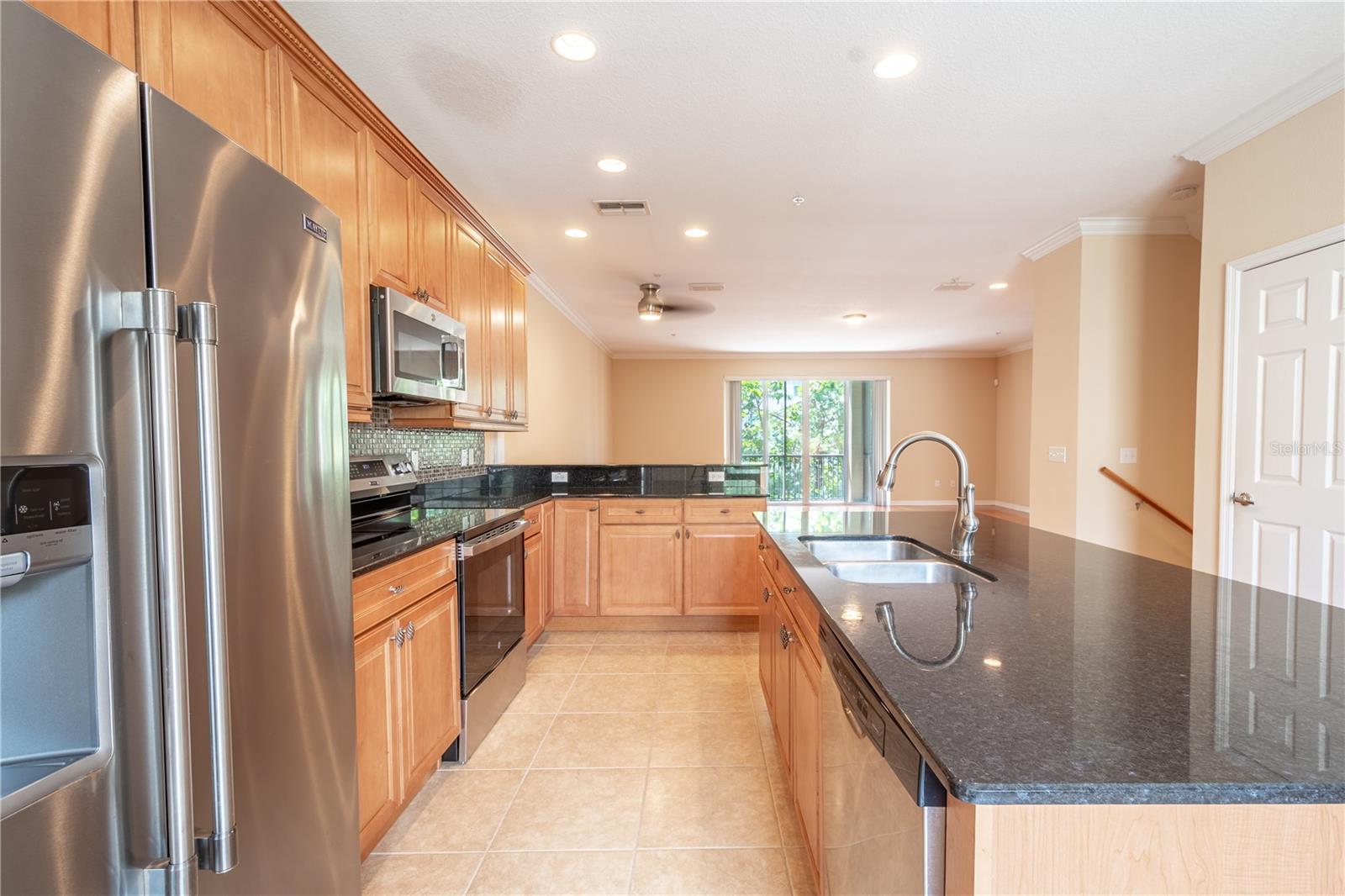 The kitchen has a plethora of cabinet and counter space, giving you all the room you need to cook, organize, and create your favorite meals with ease.