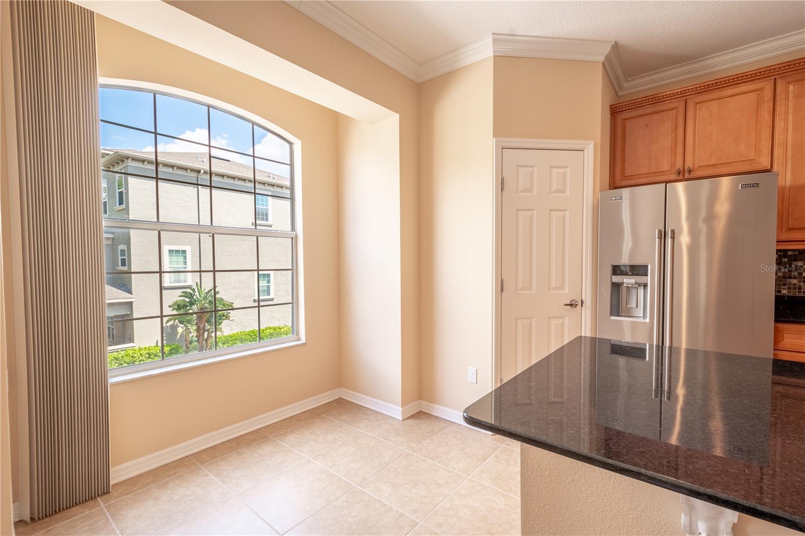 Imagine starting your day with your breakfast table right beside this window, where natural light pours in, creating the perfect spot to enjoy your morning coffee.