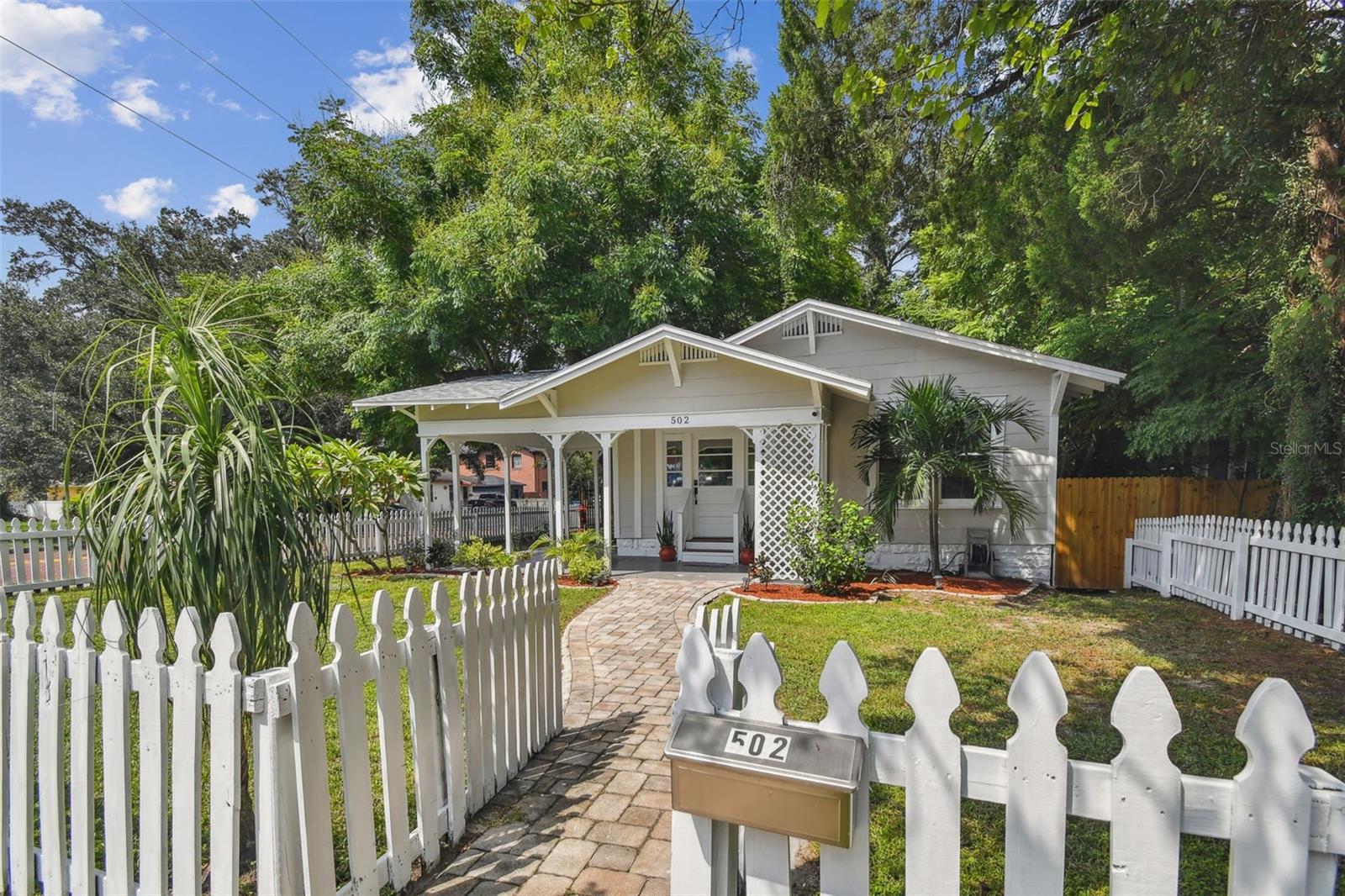 White Picket Fence Charm!  Fully Fenced Yard!