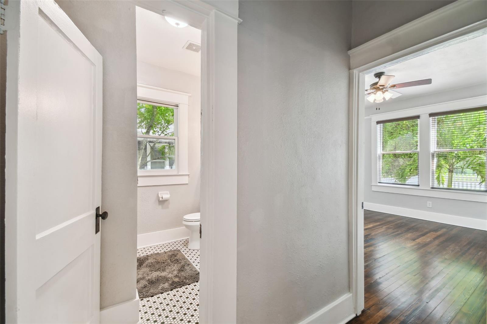 Hallway to Front and Primary Bedrooms and Bath