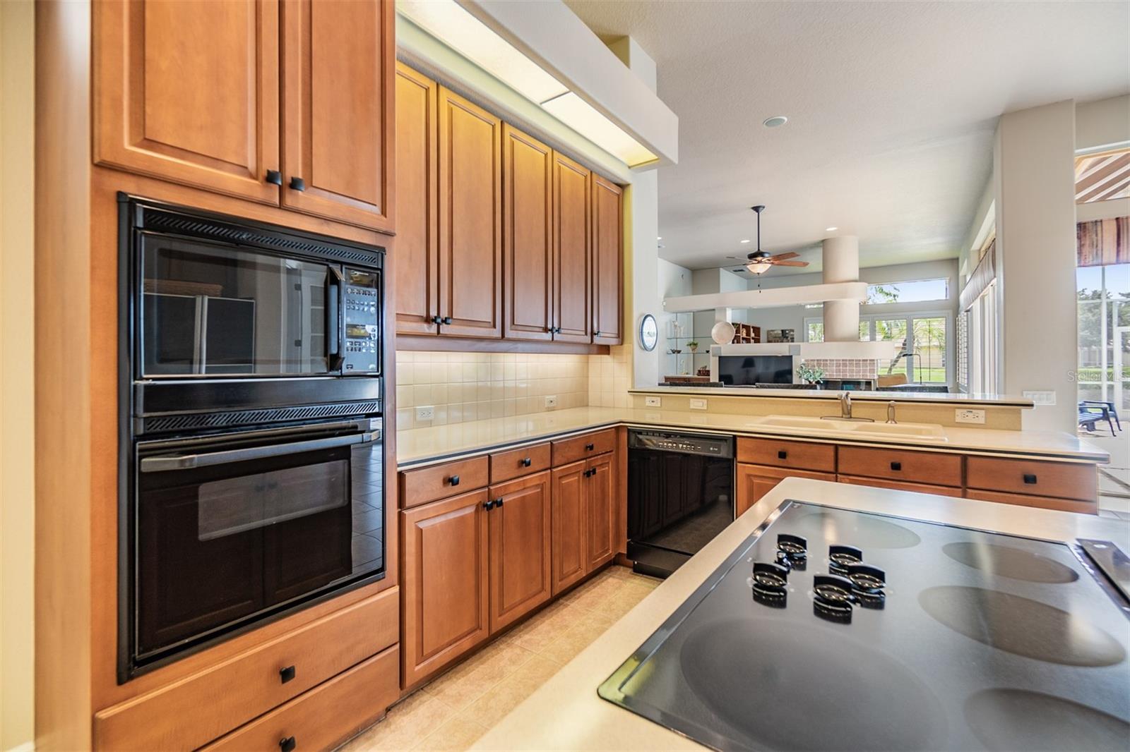 Open Kitchen, Tile flooring, Corian countertops, 12 foot ceilings