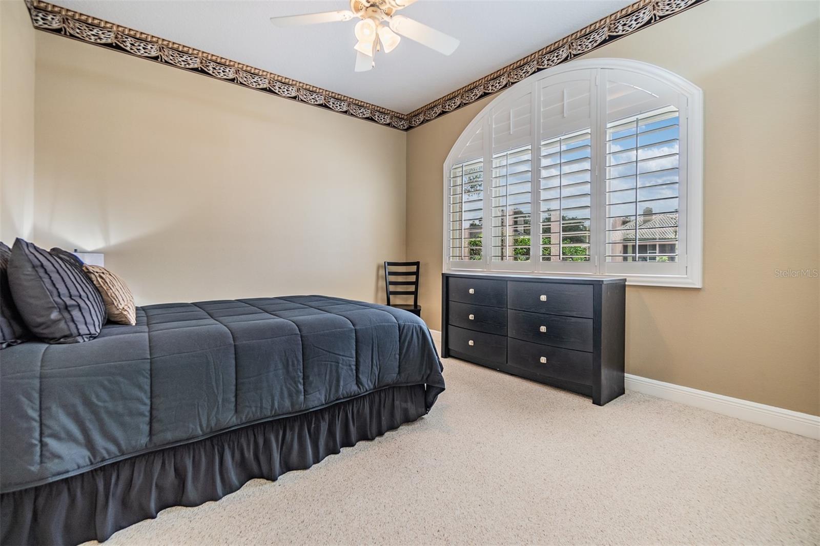 Guest Room, Ceiling Fan, Plantation Shutters. (This one is part of the mother in-law suite)