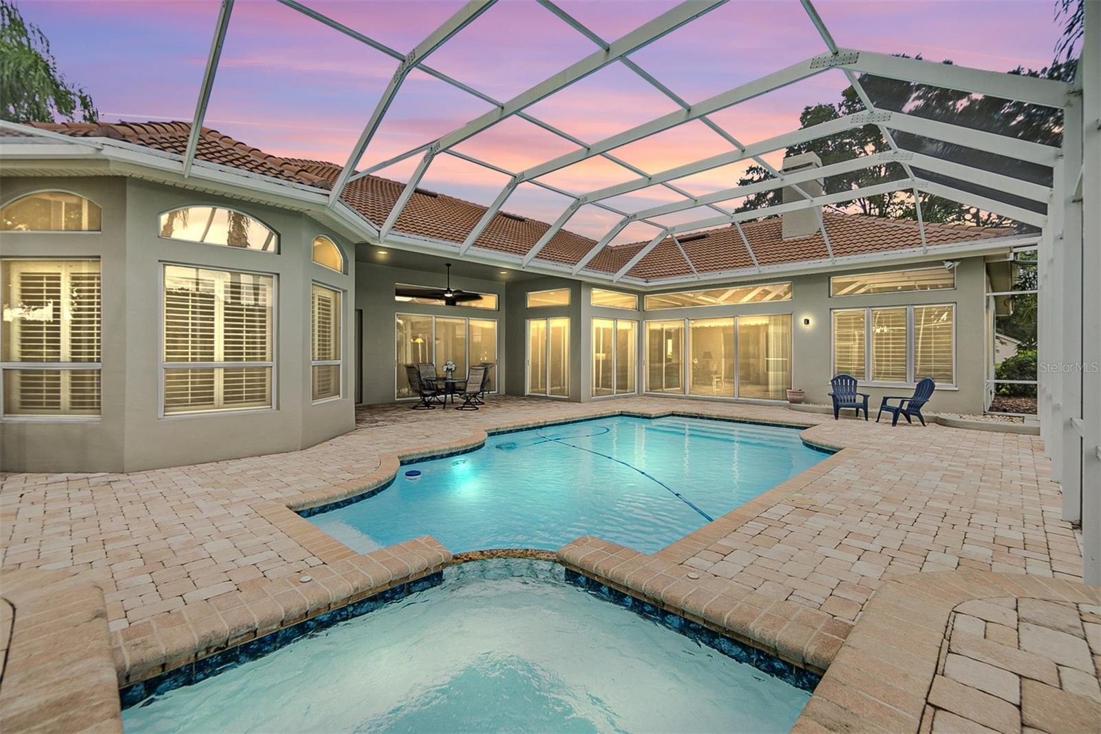 View of the pavered lanai and pool/spa