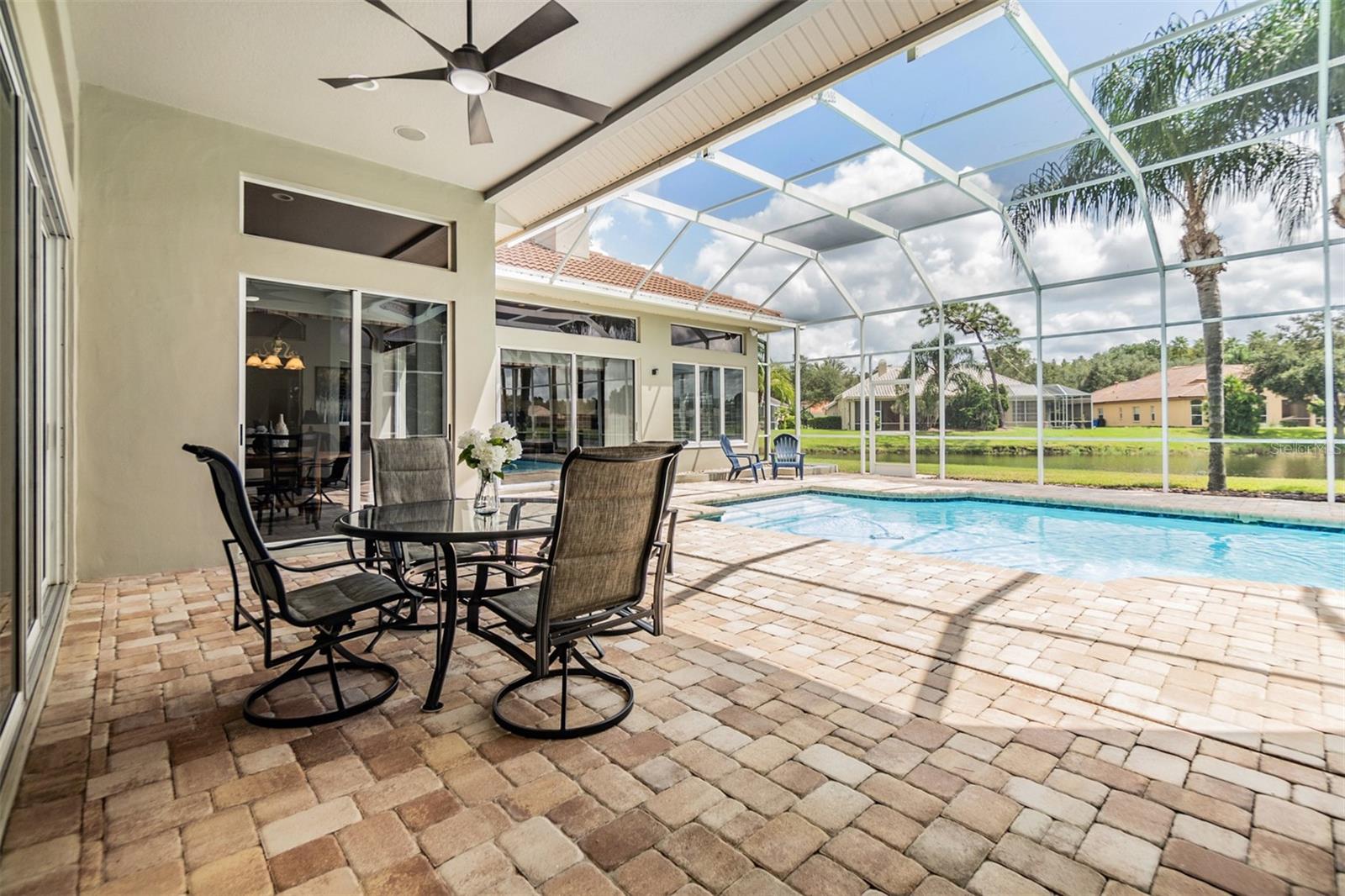 Plenty of covered area on the pavered lanai for entertaining.