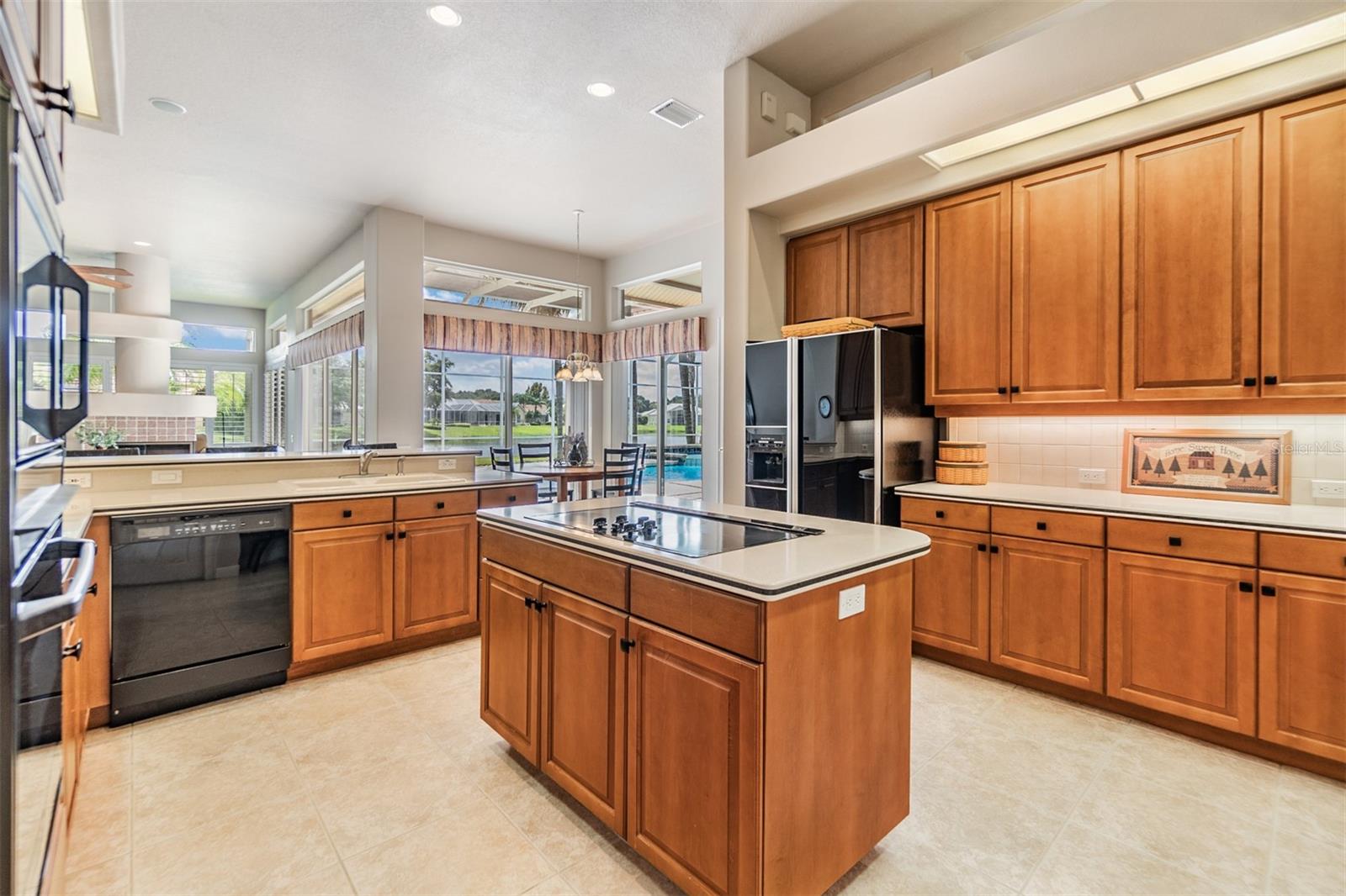 Open Kitchen, Tile flooring, Corian countertops, 12 foot ceilings