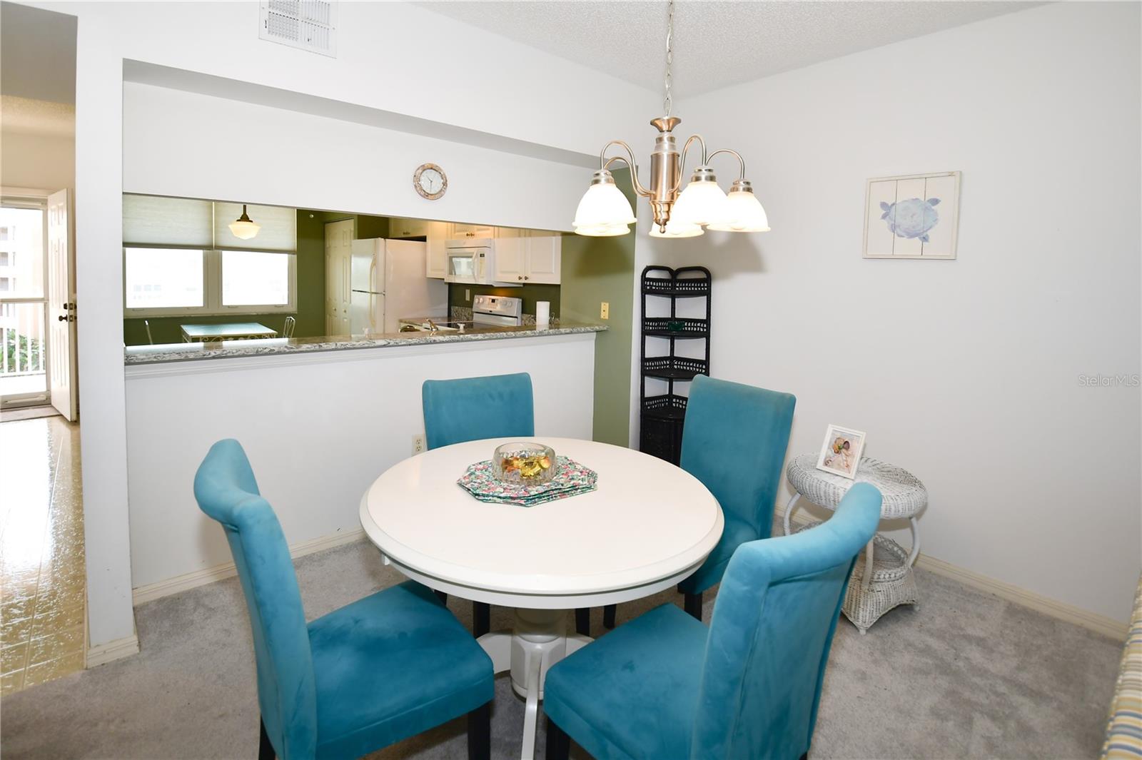 The Dining Area with the Quartz Breakfast Bar to the kitchen.