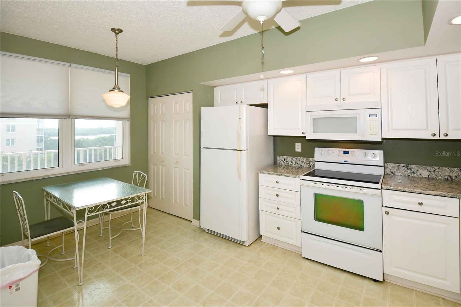 The large kitchen has  room for multiple cooks and in-kitchen dining too.