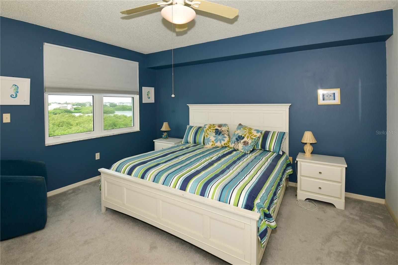 The large Primary Bedroom also enjoys panoramic water views.