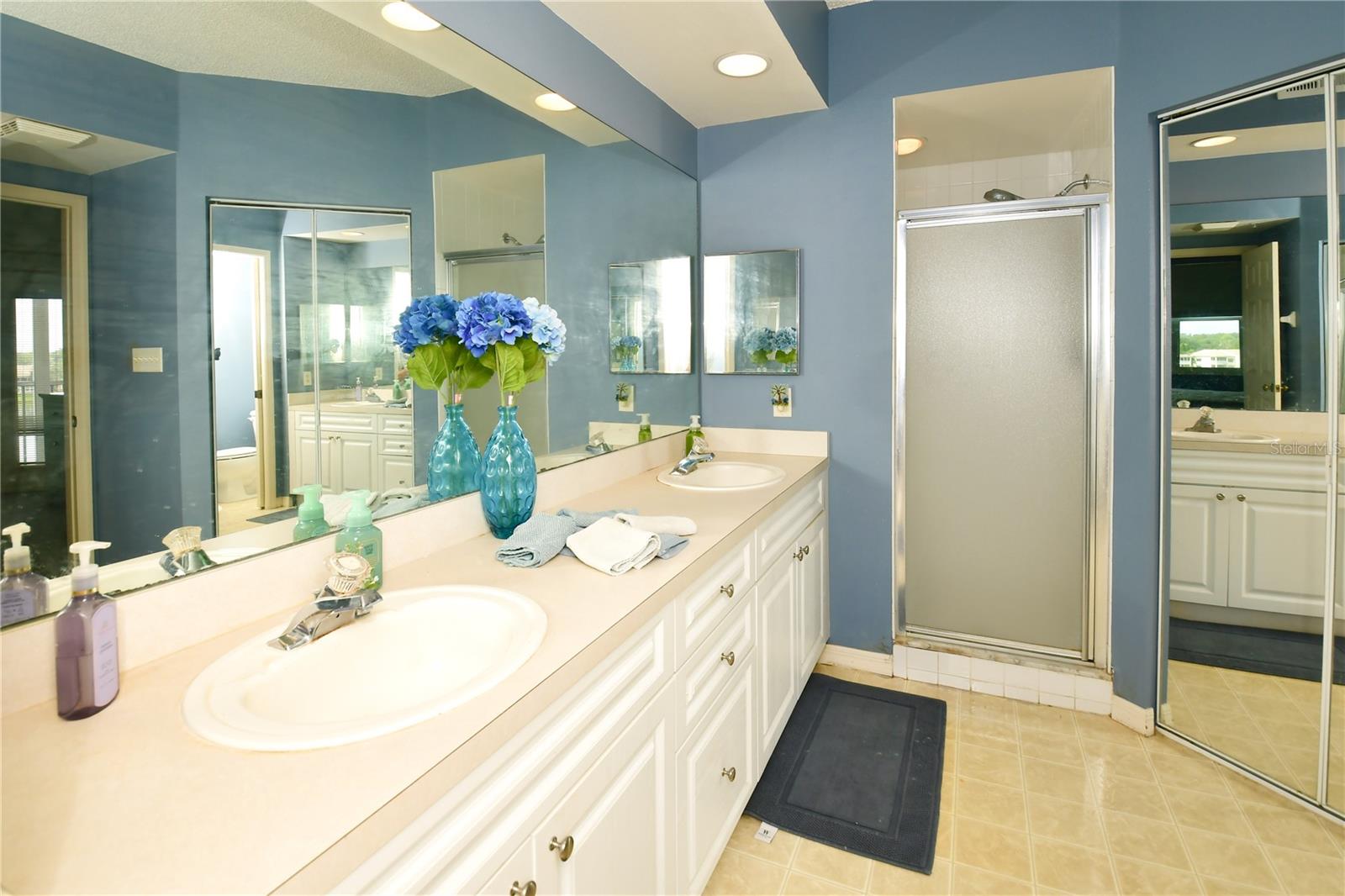 The Primary Ensuite Bathroom features dual sinks and dual walk-in closets!