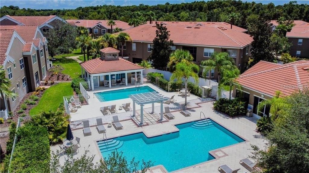 View of pool, clubhouse