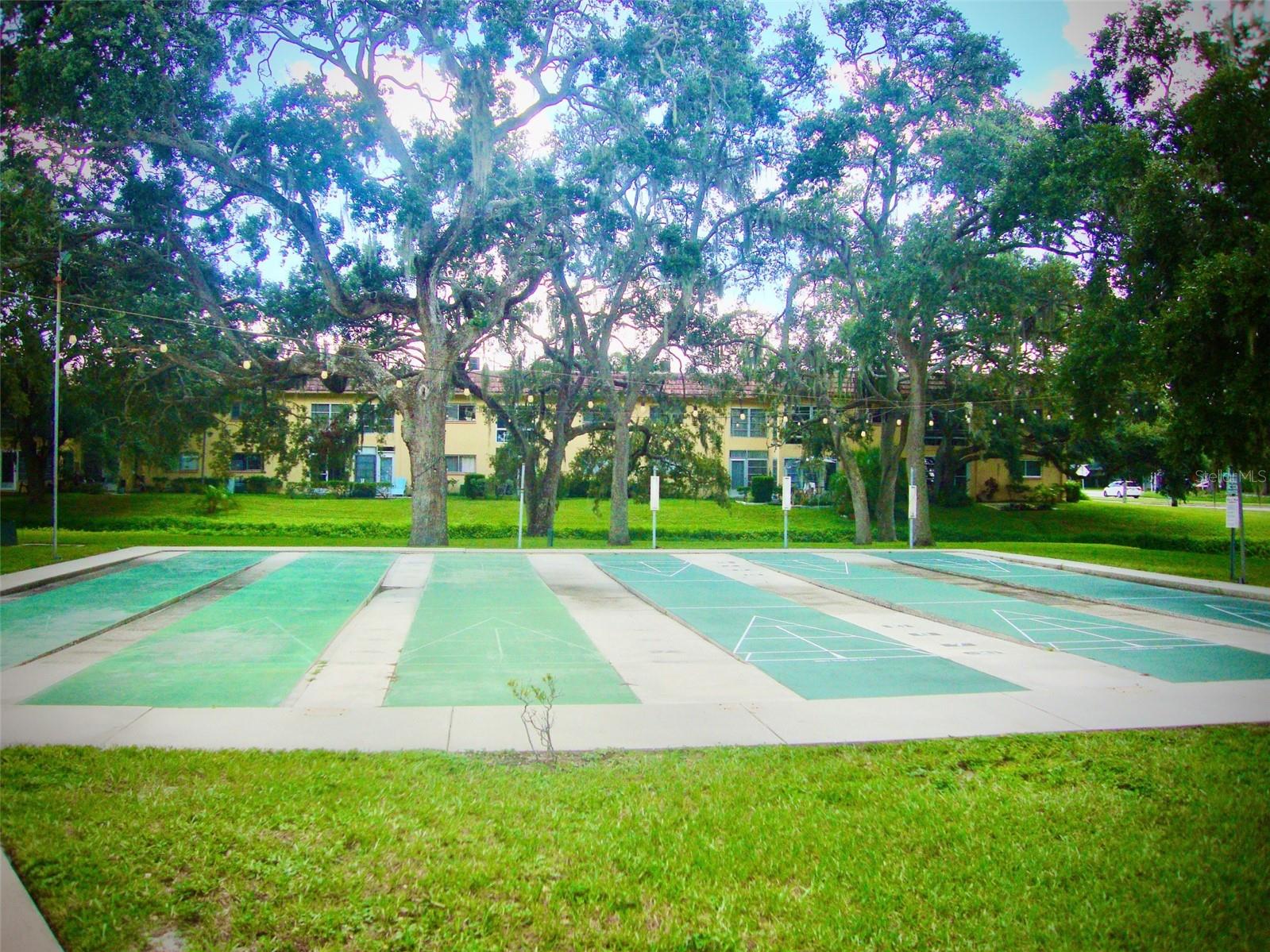 SHEFFLE BOARD OUTSIDE OF CLUB HOUSE