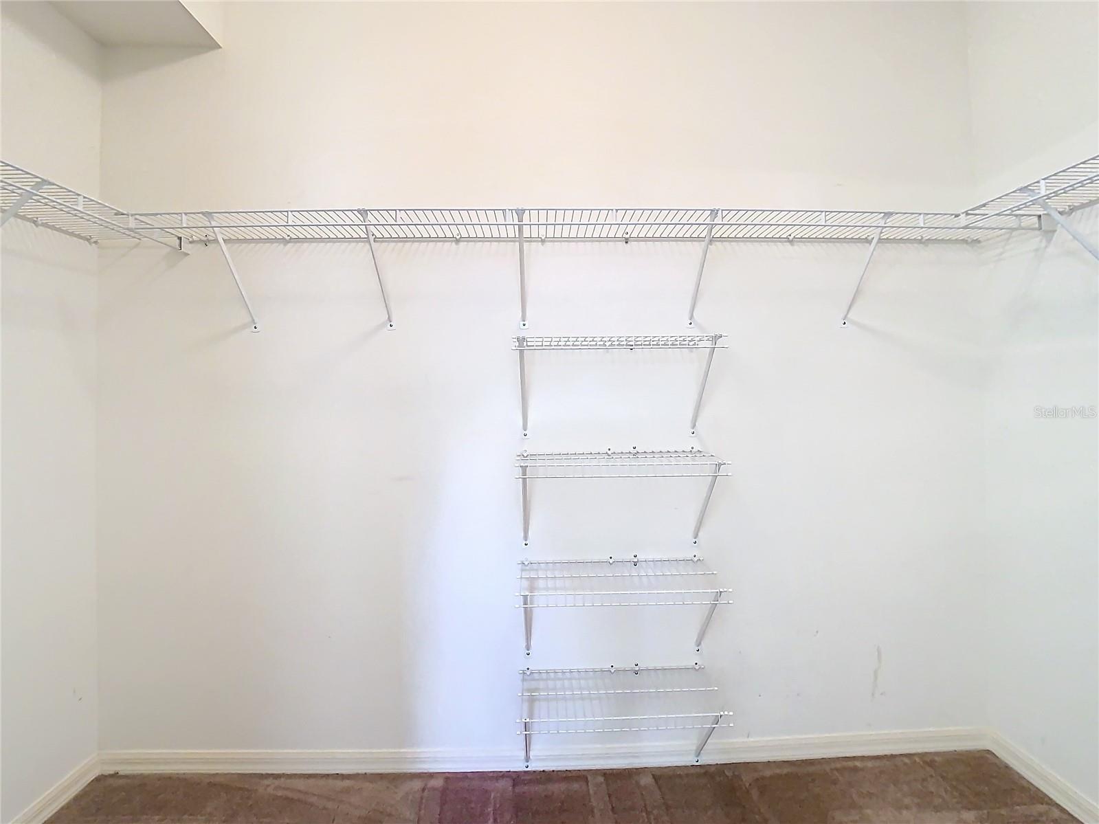 Primary Walk-in Closet.