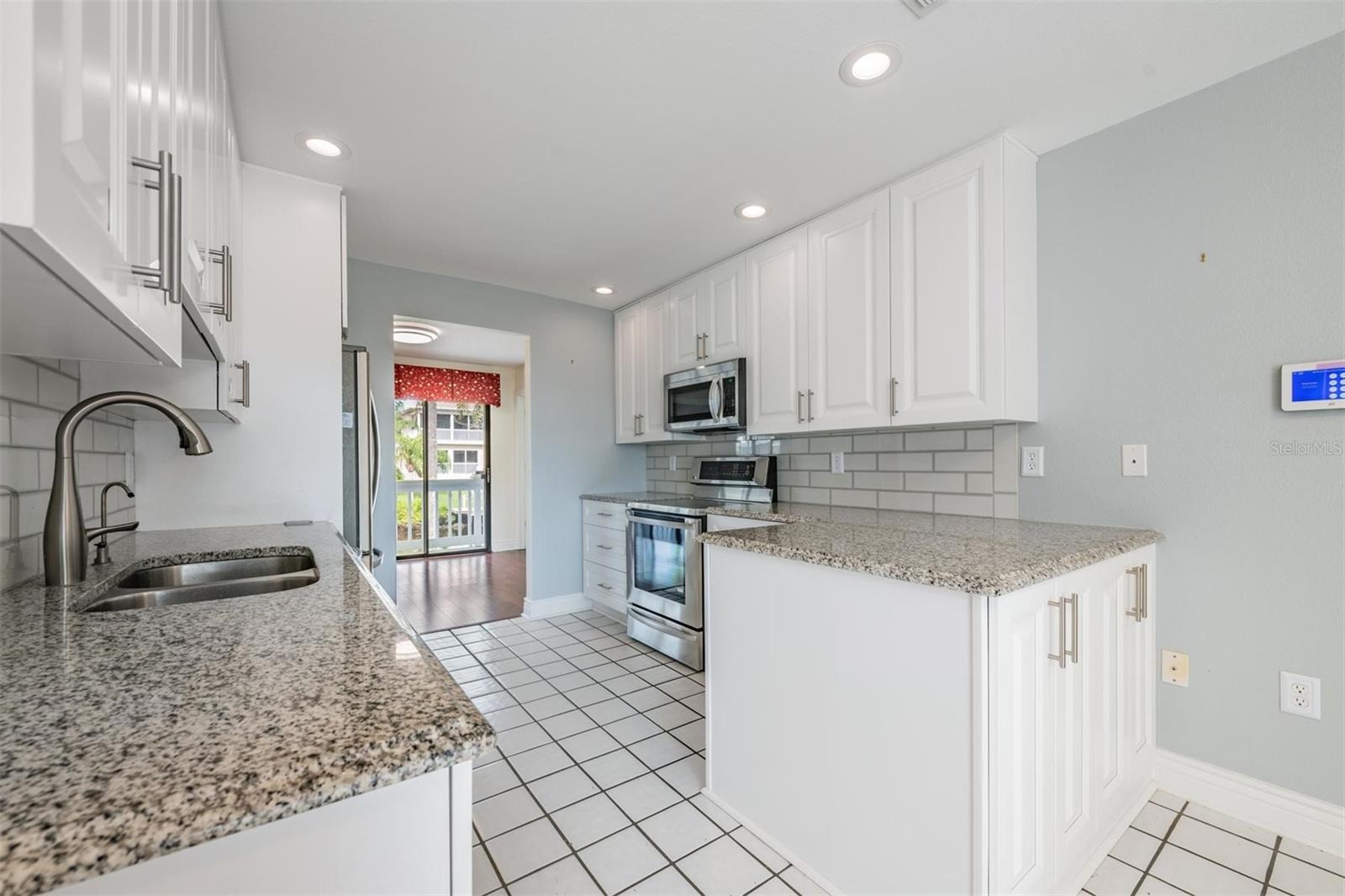 Kitchen w/ Stainless Steel appliances