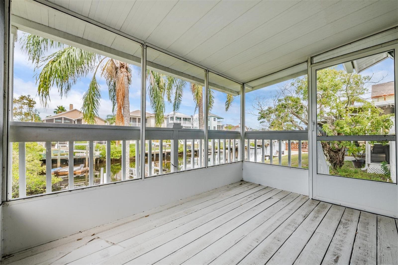 Screened Patio off of living room w/ water view