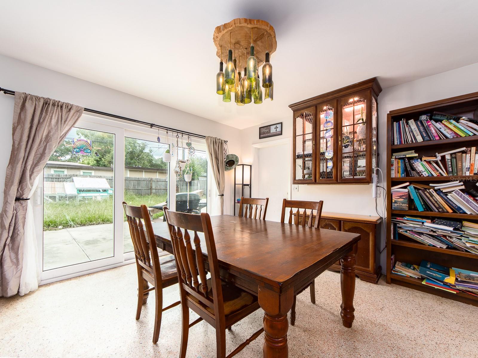 Dining area off sliders to backyard