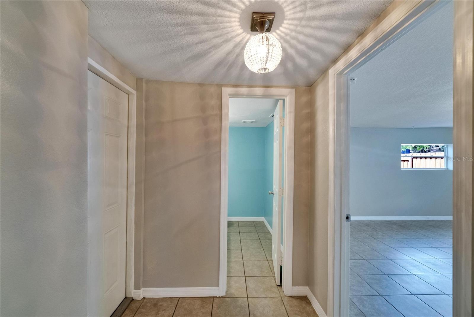 Hall way to Bonus room and half bath