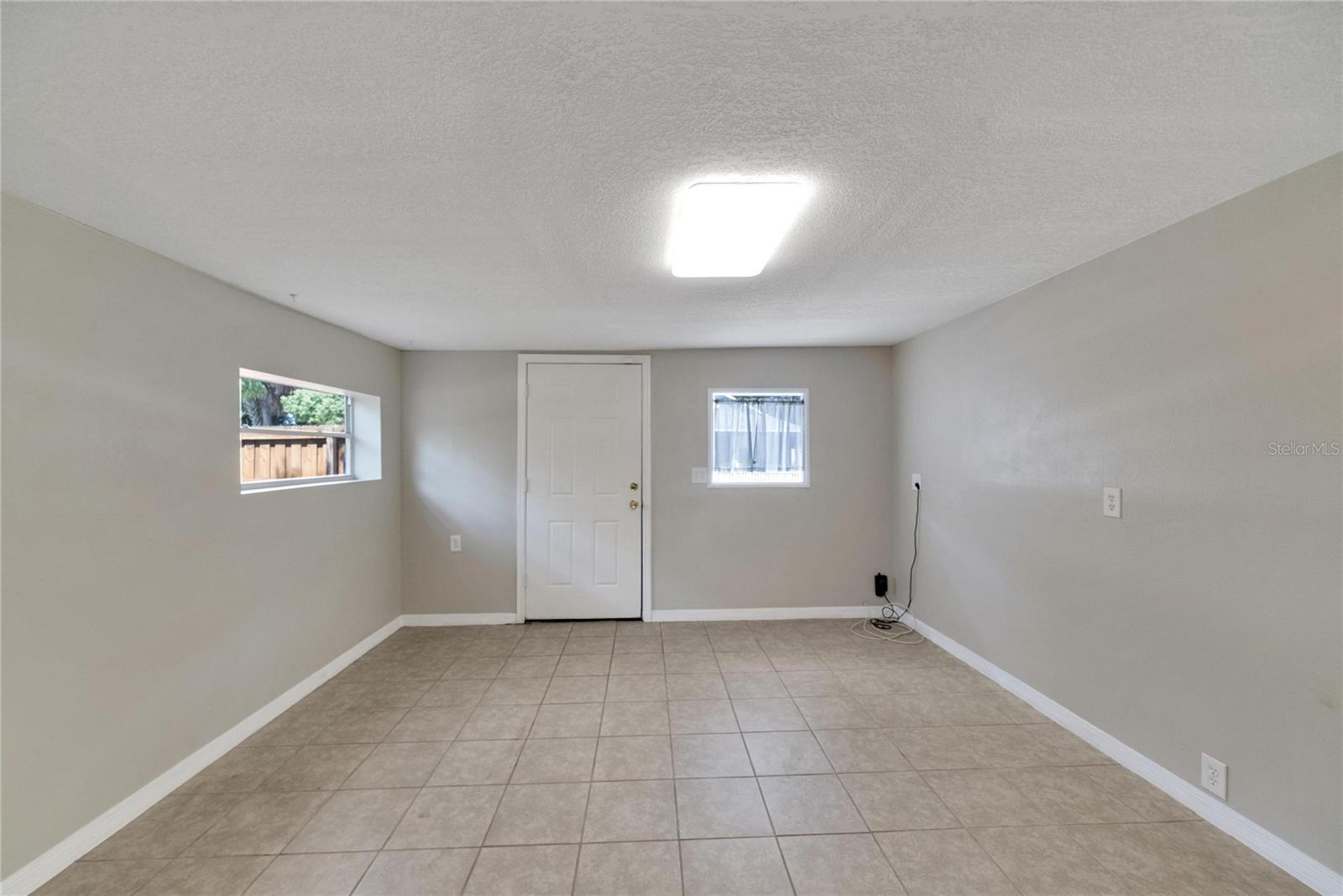 Bonus room with separate entry and half bath