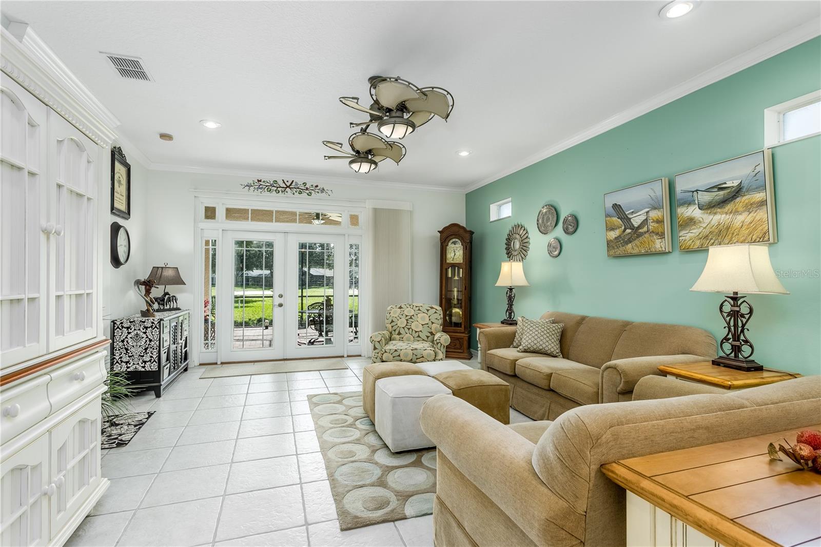 Living room with french doors to the lanai