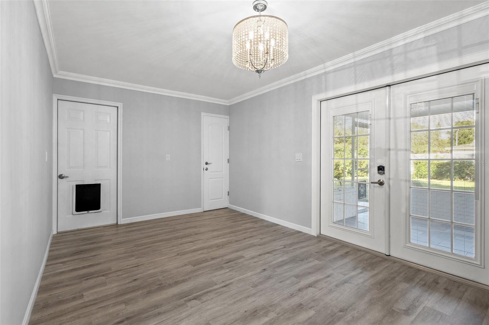 Dining area with neutral paint colors and natural light