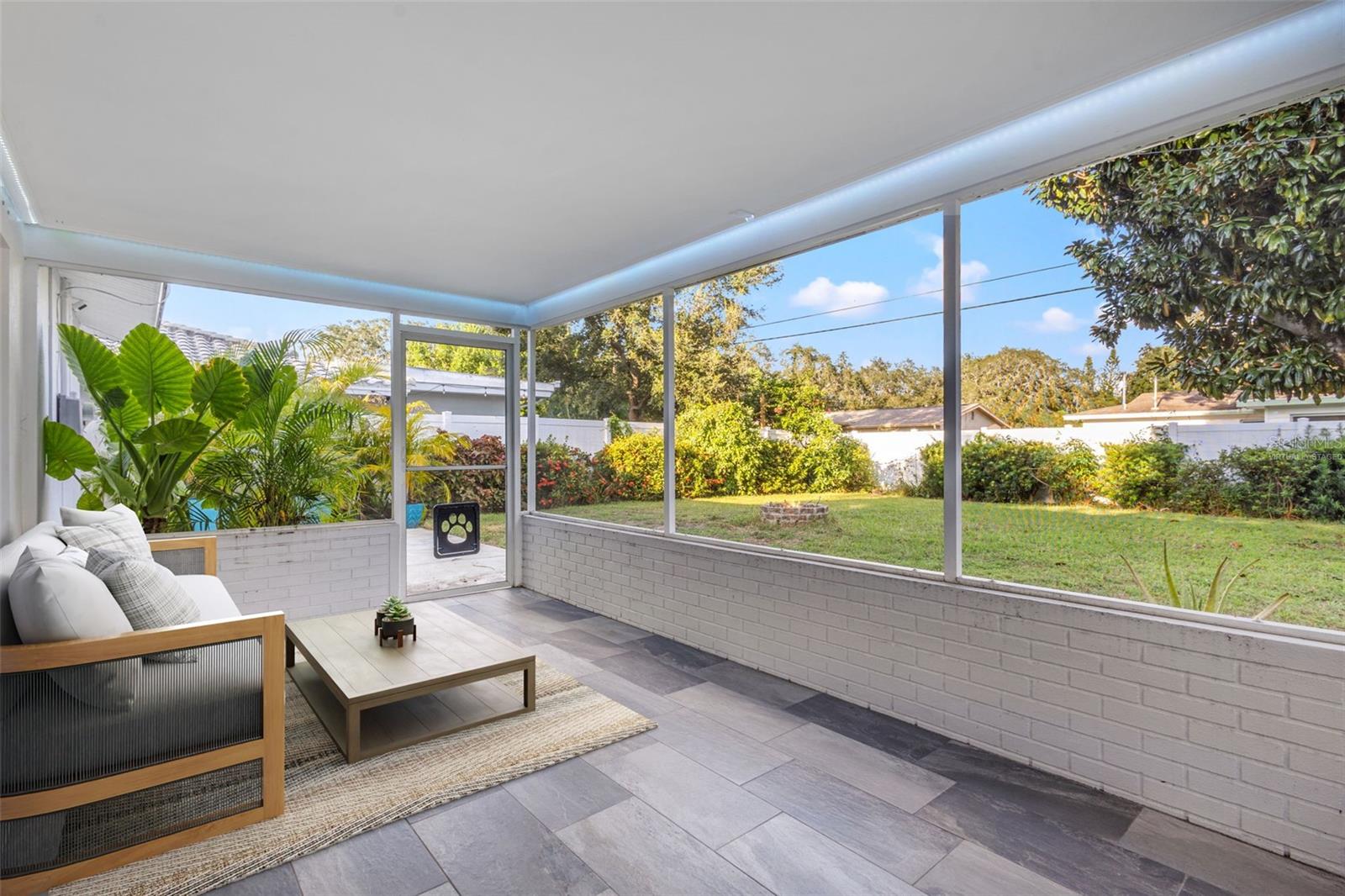 Virtually staged screened-in patio/lanai