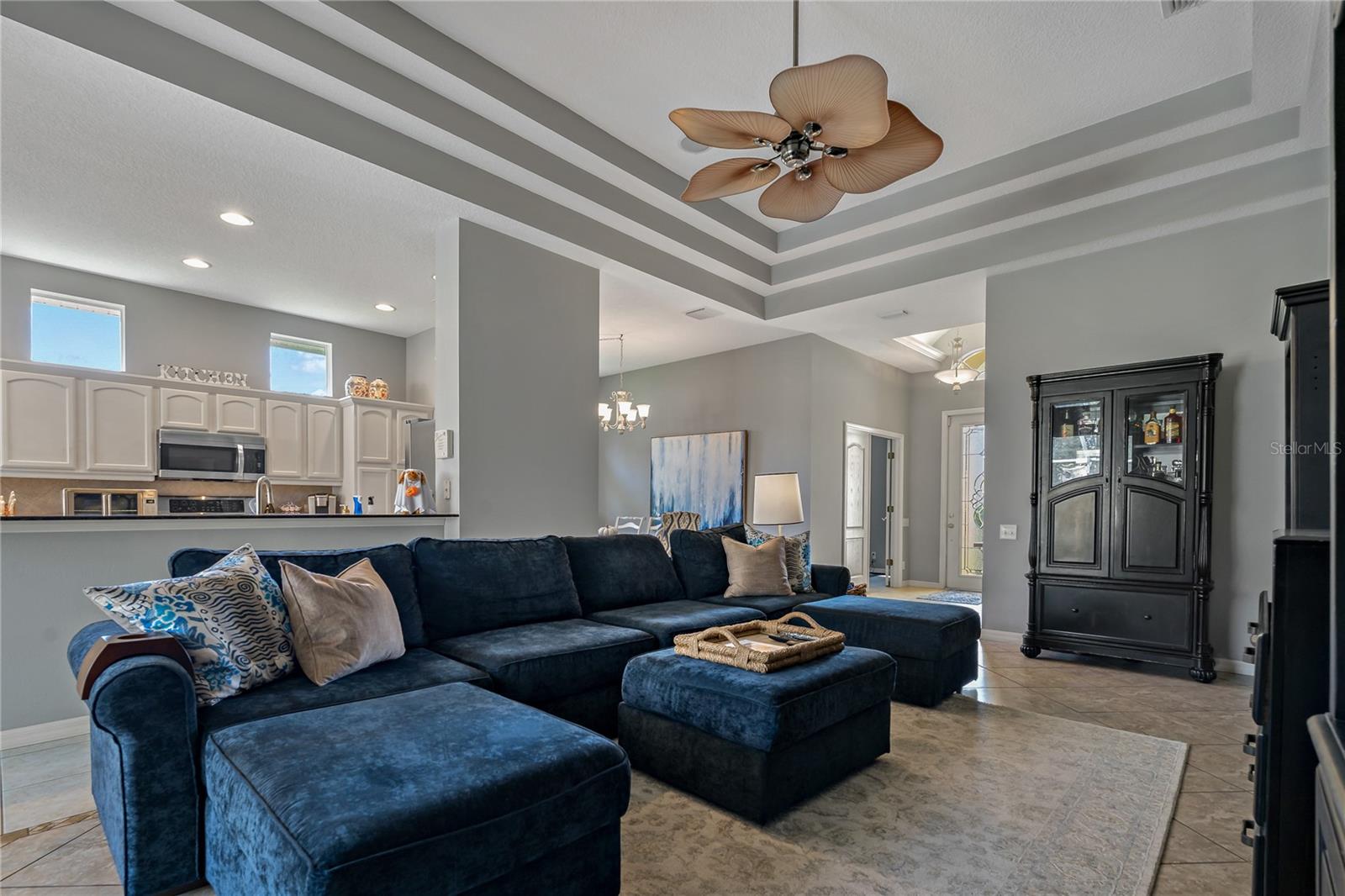 Living Room with Triple Tray Ceiling