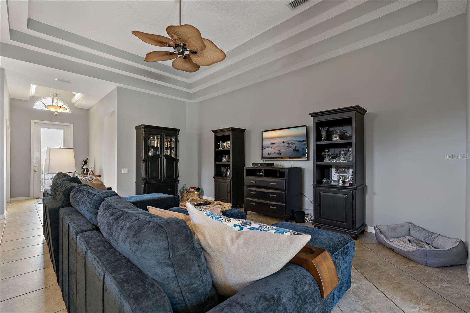 Living Room with Triple Tray Ceiling