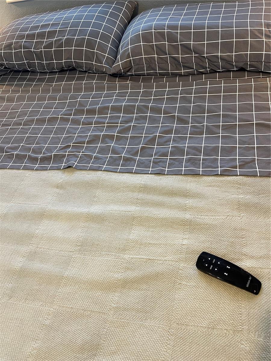 The remote for the bed