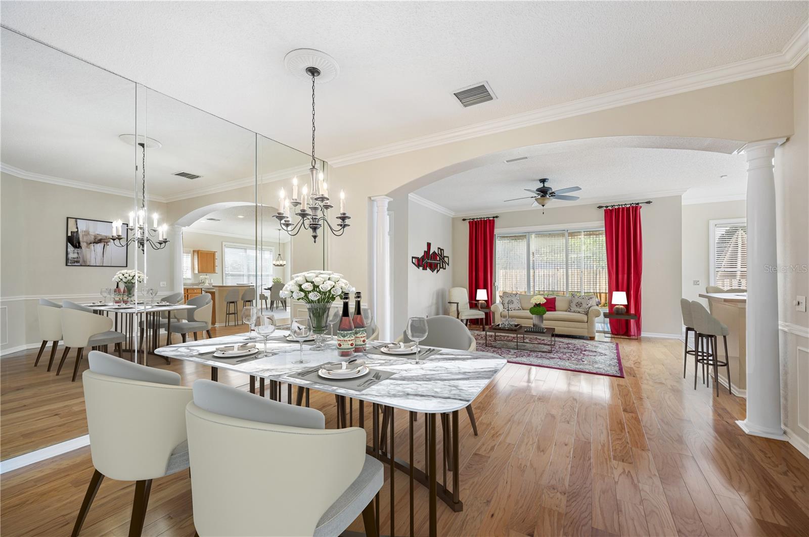 Dining Room with mirrored wall