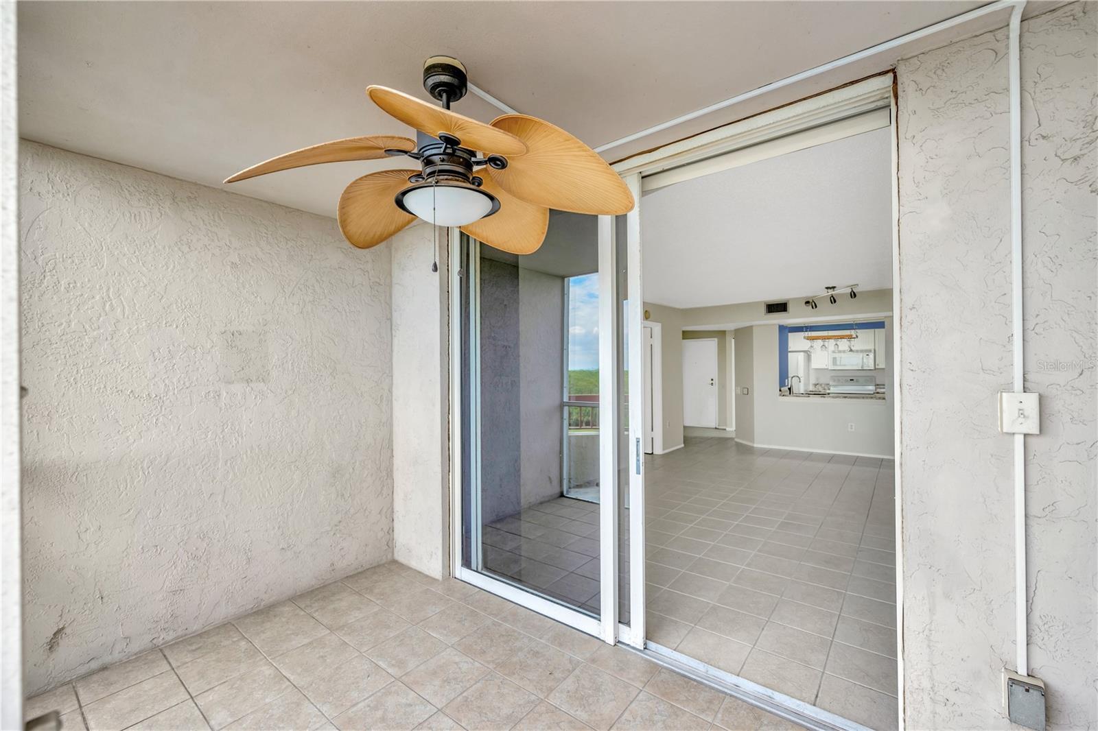 Sliding glass door entrance to balcony