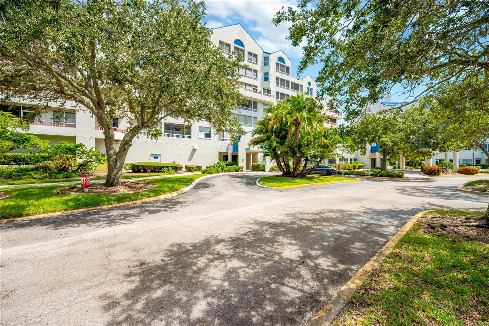 Large wooded campus with trails on golf course