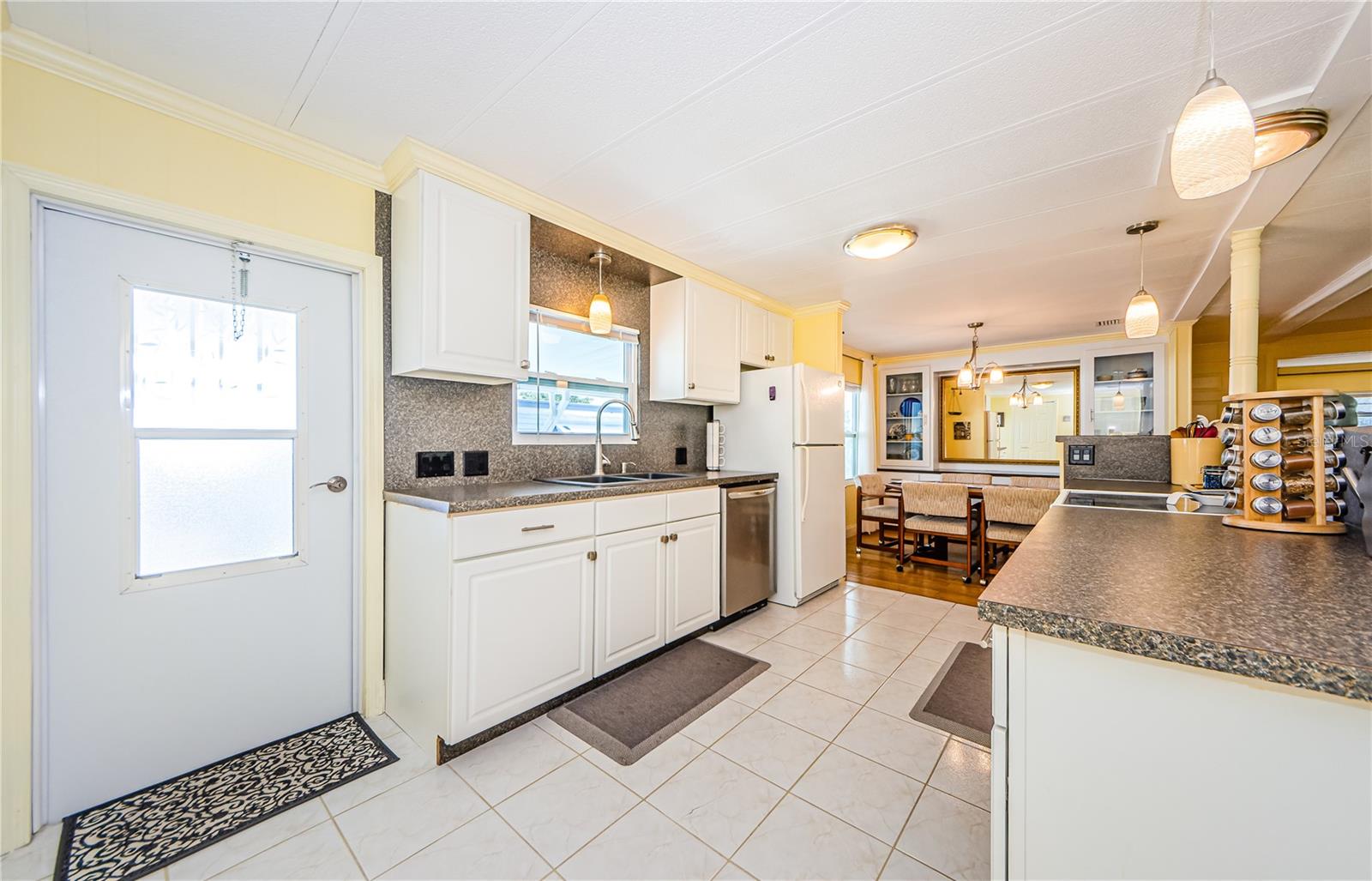 Kitchen with owner entry door