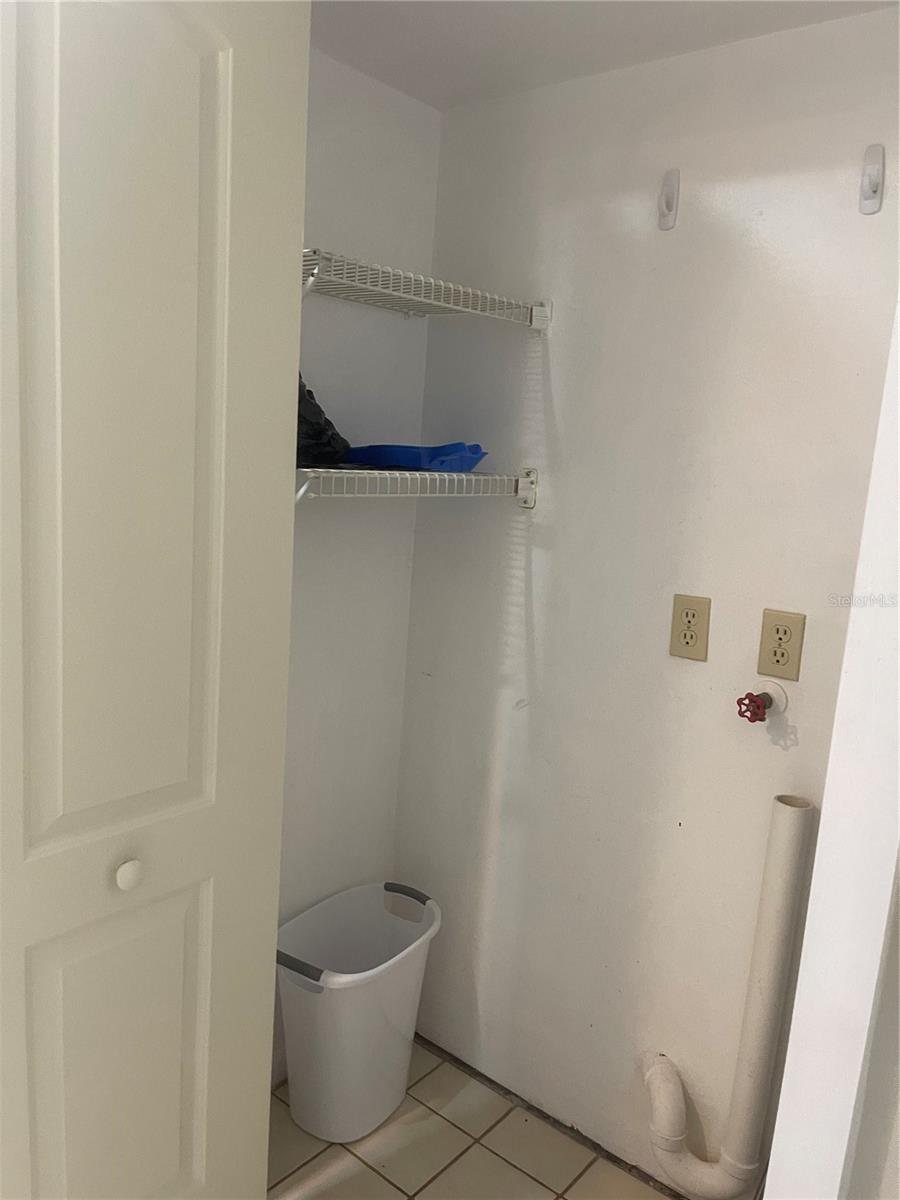 Spacious pantry with washer dryer hookups