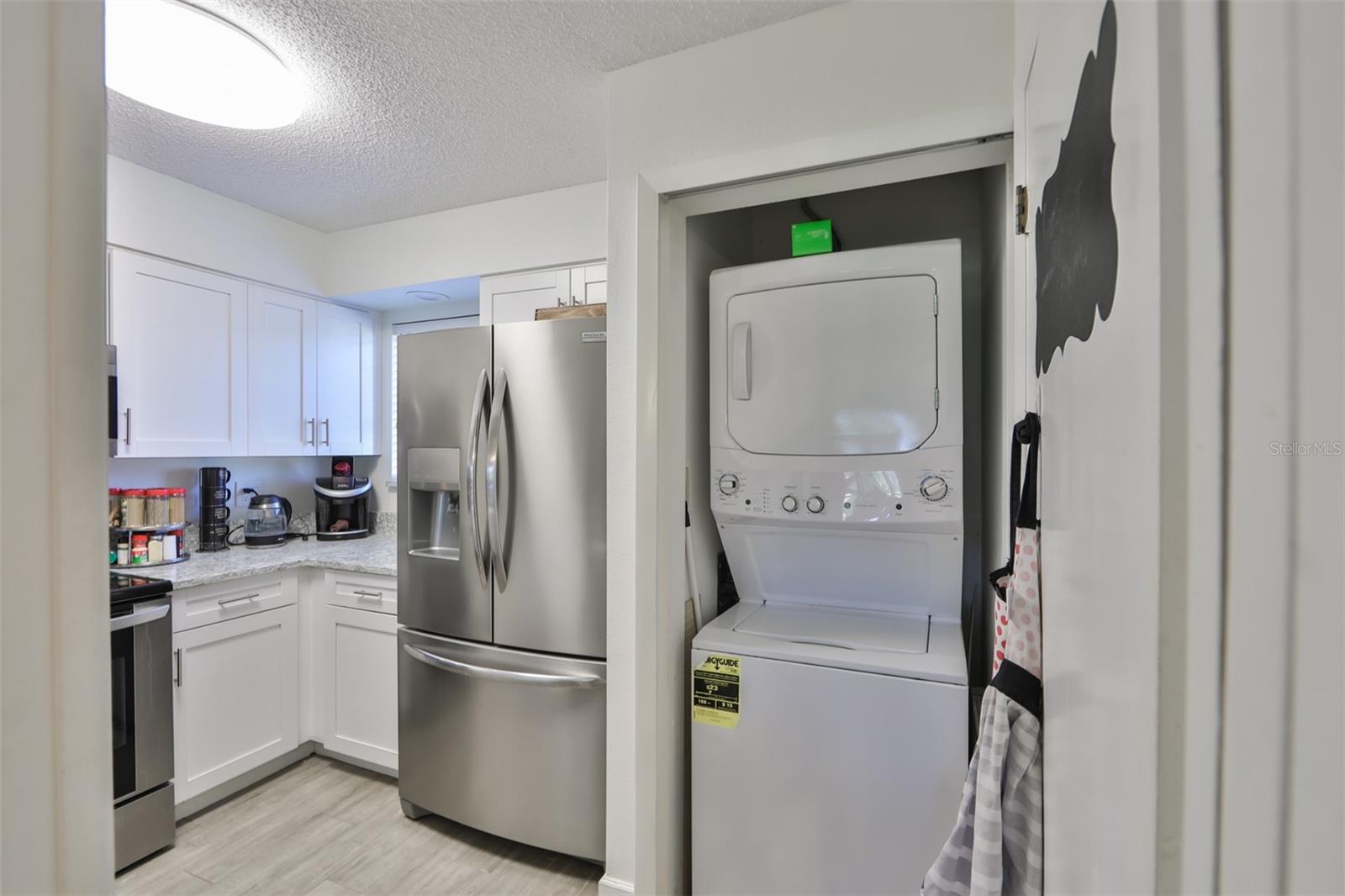 Full sized washer & dryer in the kitcher