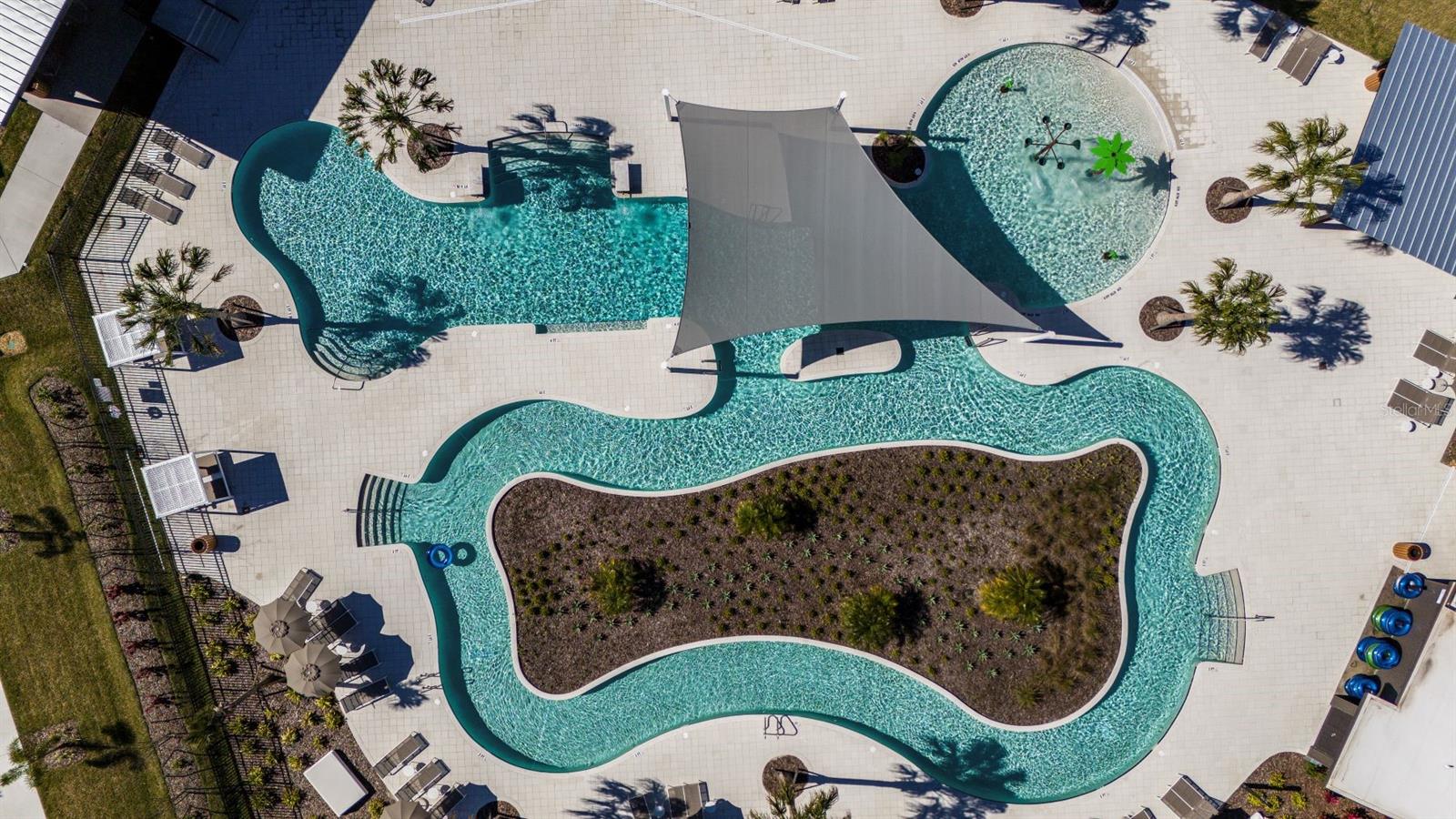 Community Pool Area With Lazy River Aerial